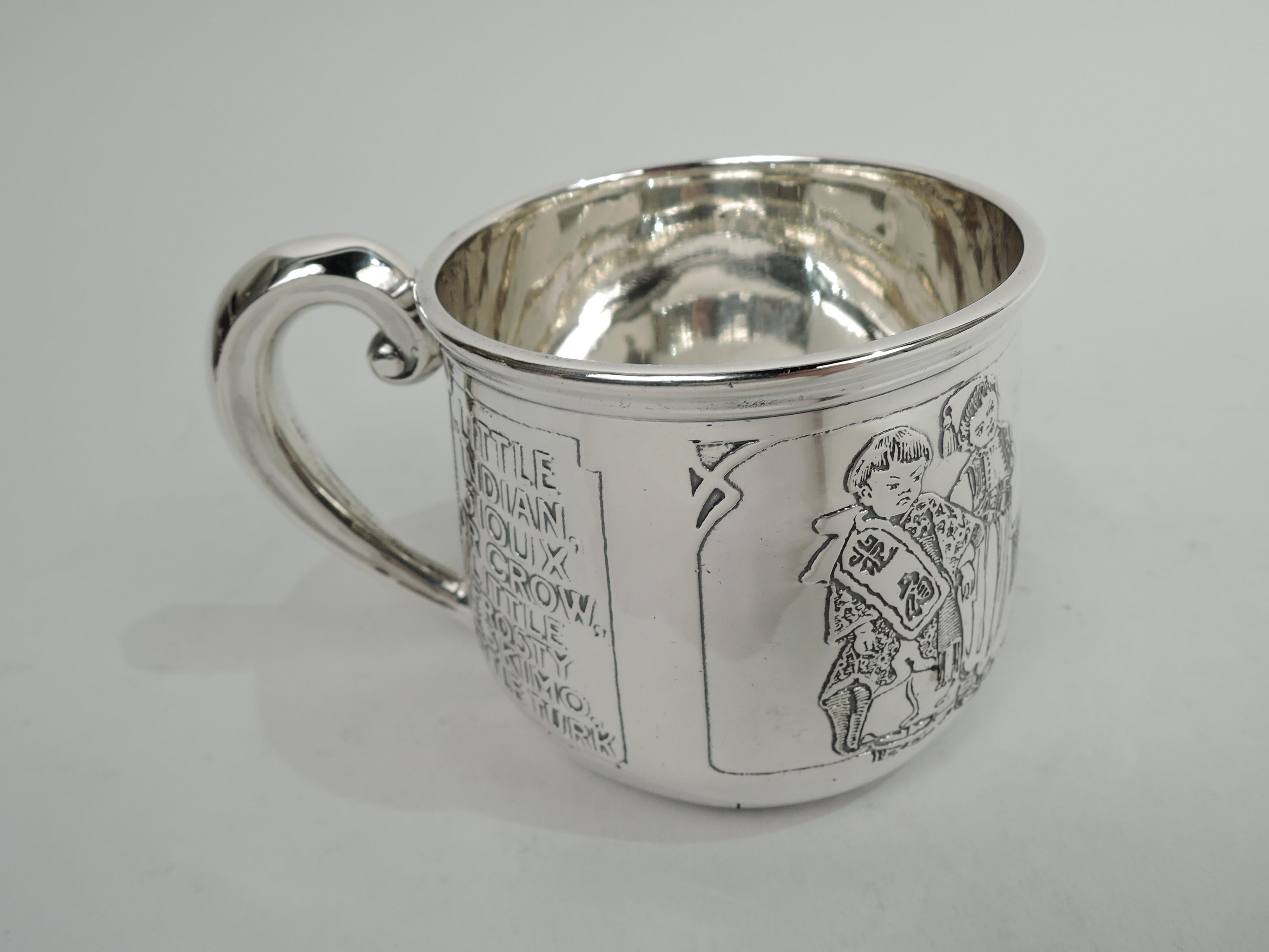 Turn-of-the-century sterling silver baby cup rich in period assumptions. Made by William B. Kerr in Newark. Upward tapering sides and scroll handle.

Acid-etched frieze depicting sailor-suited, flag-holding, all-American boy with exotic coevals in