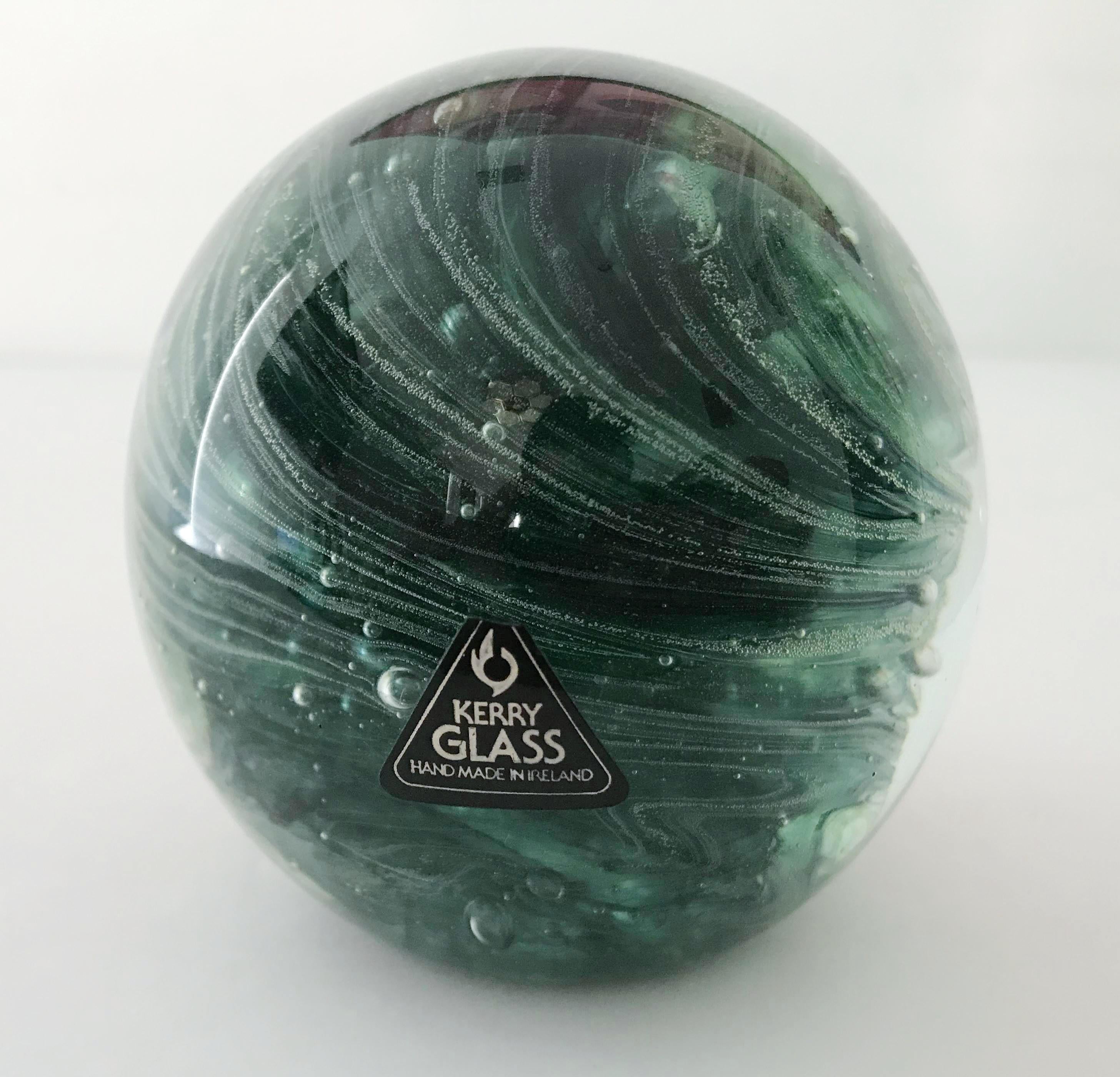 Vintage Kerry glass paperweight hand blown in dark green color with small bubbles / Made in Ireland, circa 1980s
Original stickers on the glass and base
Measures: diameter 3 inches, height 3 inches
1 in stock in Palm Springs ON 50% OFF SALE for $199