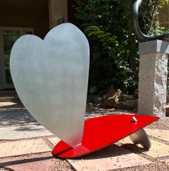 Three Balancing Hearts, sculpture, by Kerry Green, Santa Fe, red, silver, outside