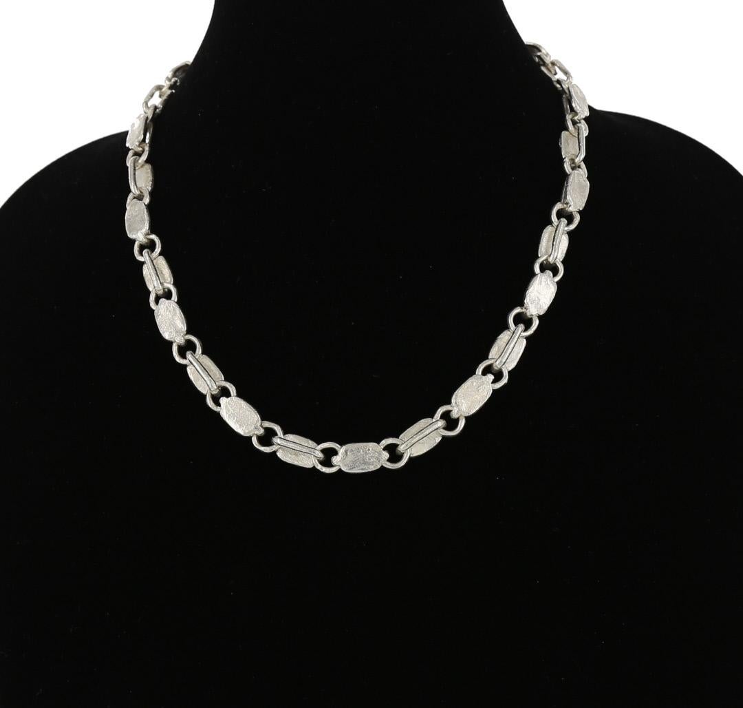 Heavy Silver link necklace appropriate for either men or women.
The links were originally molded from wax so soft it retains my fingerprints. 
Total length including  S Hook clasp is 21 inches.