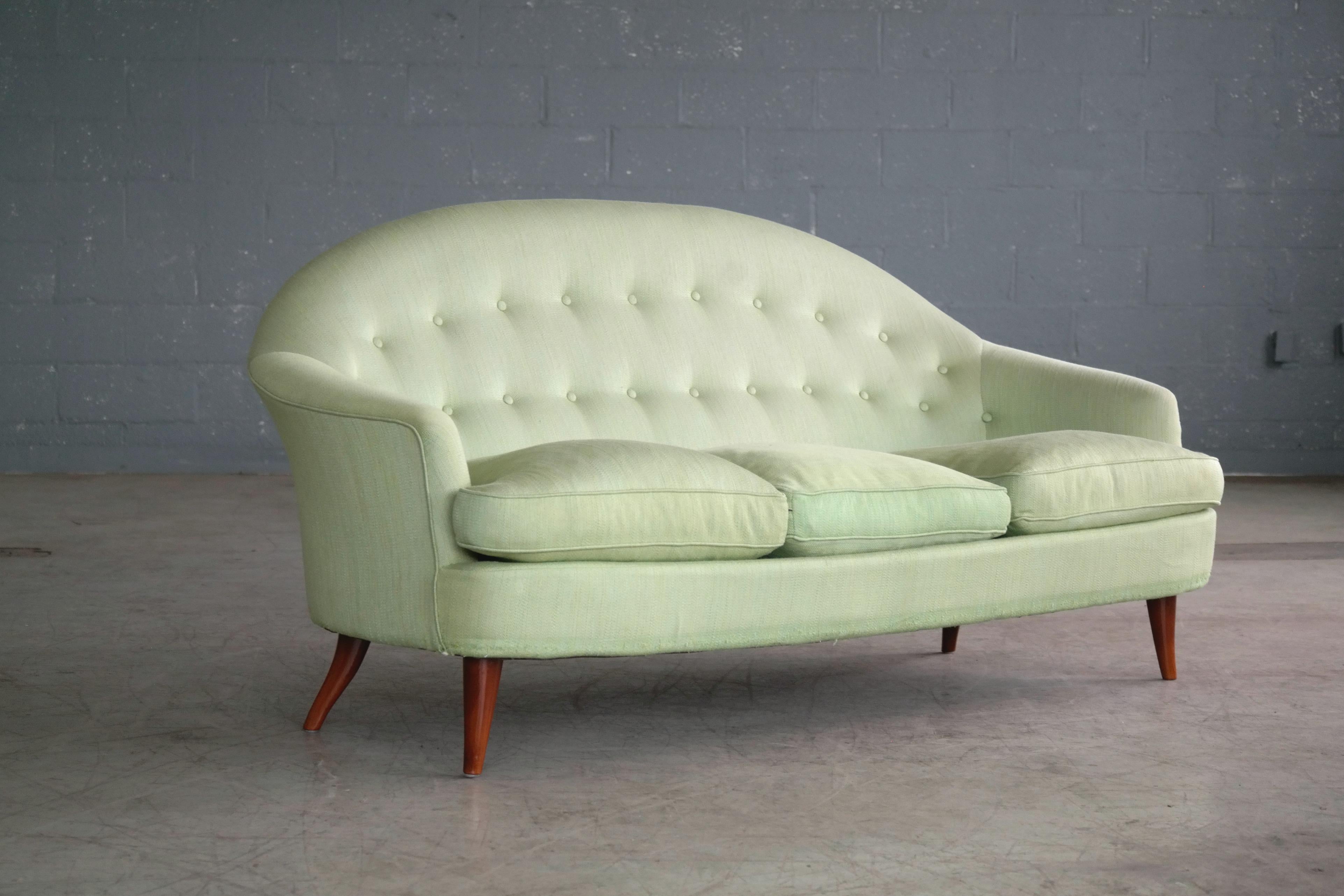 Very interesting Scandinavian sofa presumably Swedish made and very likely a customized version of kerstin Horlin-Homquist's Paradise sofa. The sofa is almost identical to her paradiset sofa aside from the fact that the legs are slightly shorter and