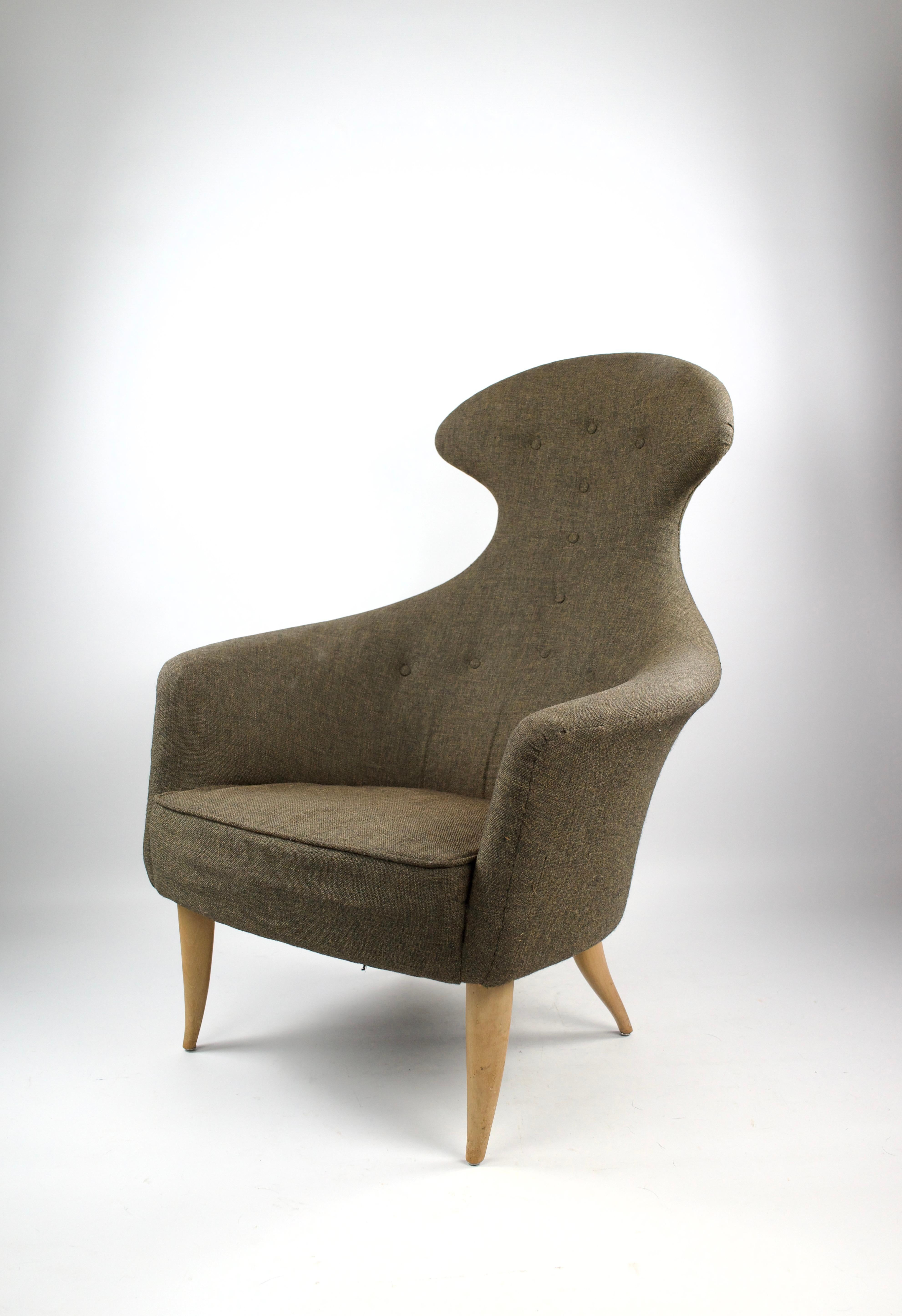 Superba ed elegante poltrona alta 