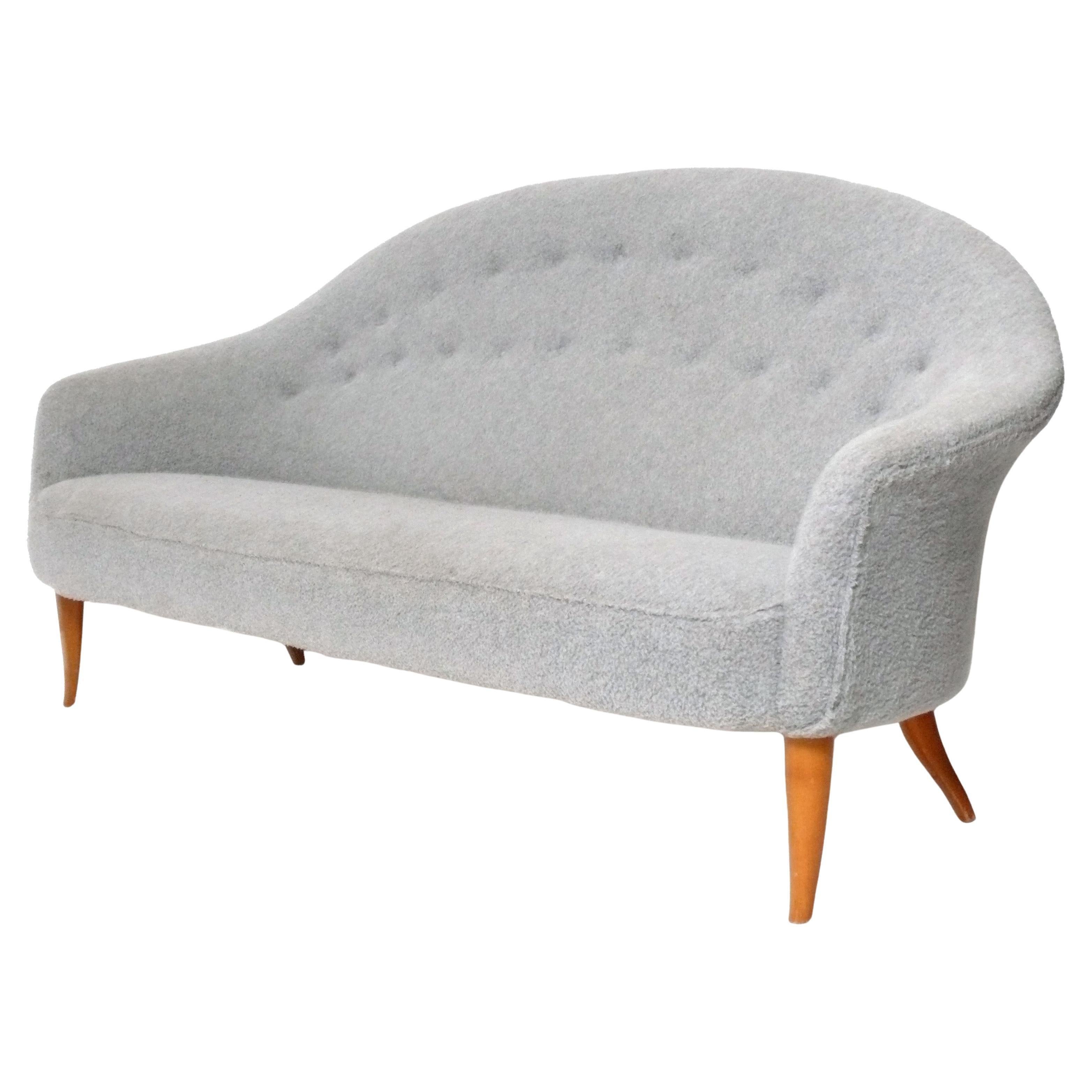 Curvaceous Danish Modern Sofa, designed by Kerstin Hörlin-Holmquist, Sweden, circa 1960s. This 