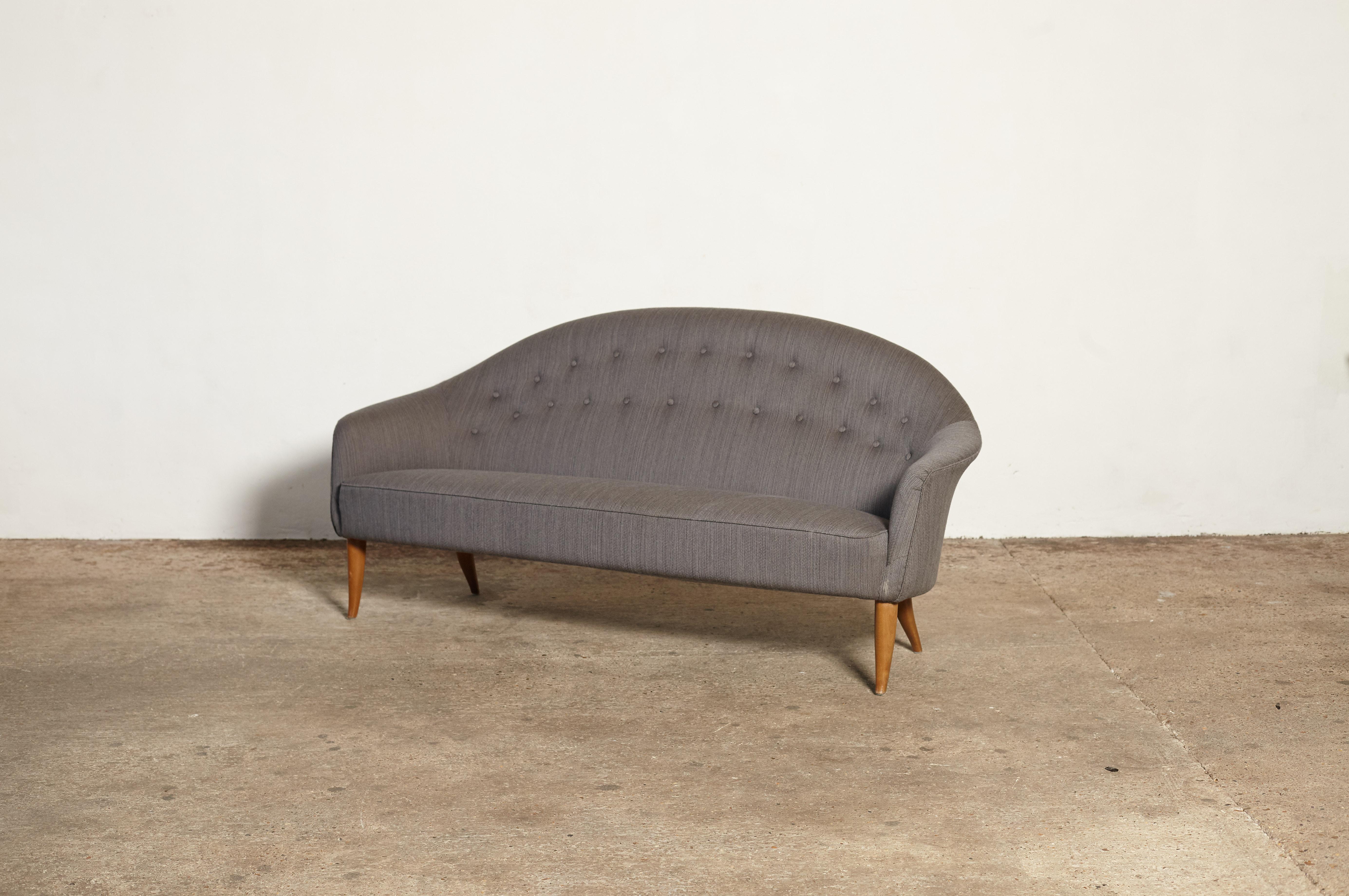 Curved Kerstin Horlin Holmqvist ‘Holmquist’ Paradiset ‘Paradise’ sofa designed in the 1950s for Nordiska Kompaniet (NK), Sweden. Upholstered in grey fabric.  Ships worldwide.




UK customers please note:    displayed prices do not include VAT.
