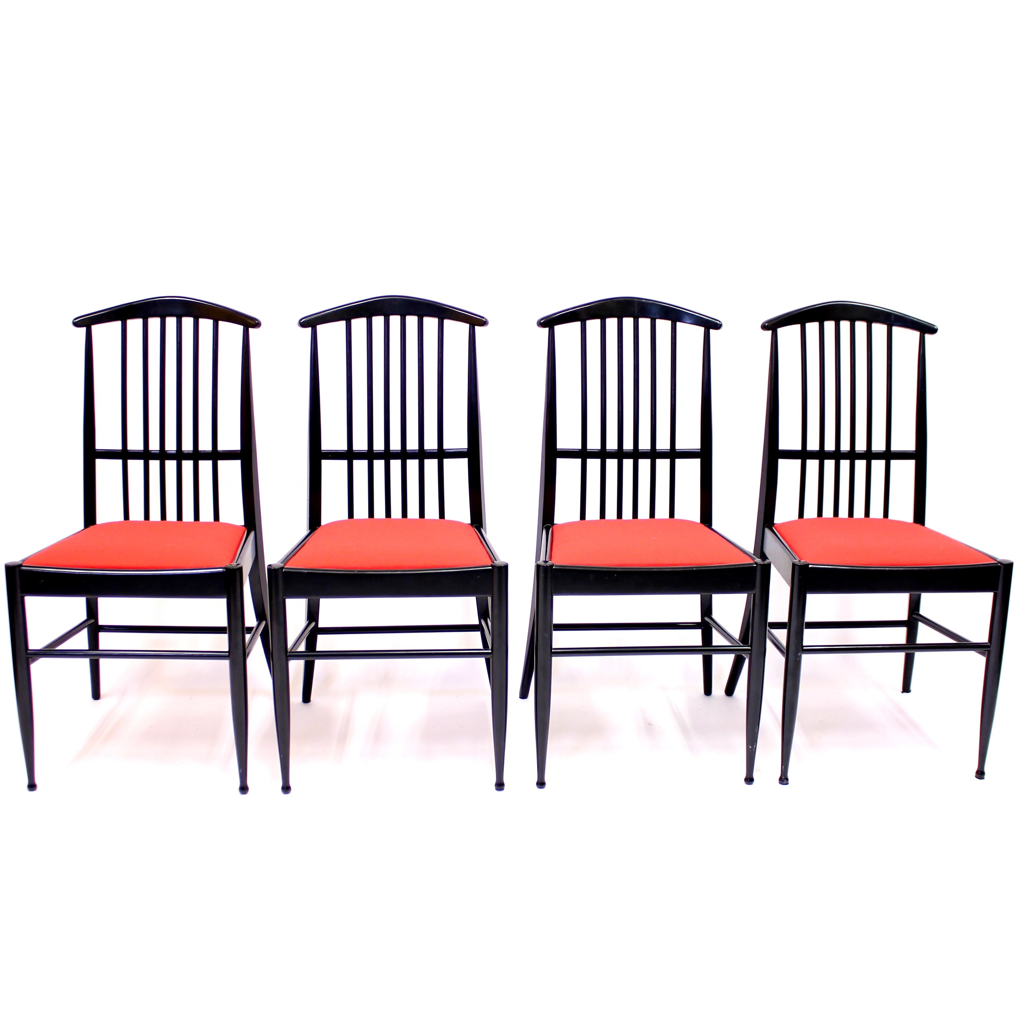Set of 4 black lacquered dining chairs designed by Swedish designer Kerstin Hörlin-Holmquist who mainly worked for Swedish furniture manufacturer NK but the Charlotte dining range (the model is sometimes also called Charlotta) was designed for