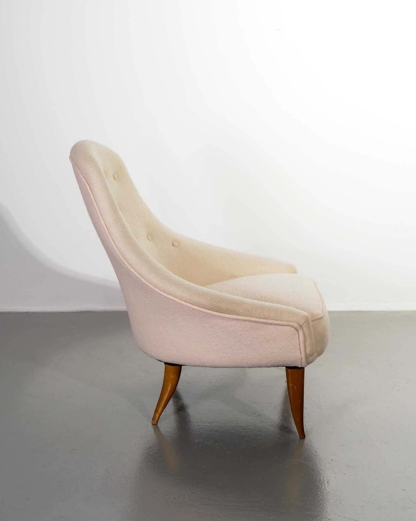 Conçu en 1958 pour Nordiska Kompaniet
H84 x W68 x D67 cm
