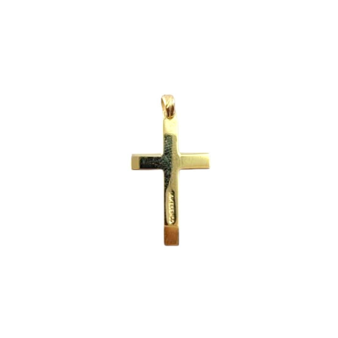 Ciondolo a forma di croce in oro giallo Kesemco 14K.

Questo ciondolo a forma di croce in oro giallo 14K presenta un design lucido e senza tempo che incarna la fede e la devozione con elegante semplicità. Realizzato in oro giallo brillante, offre