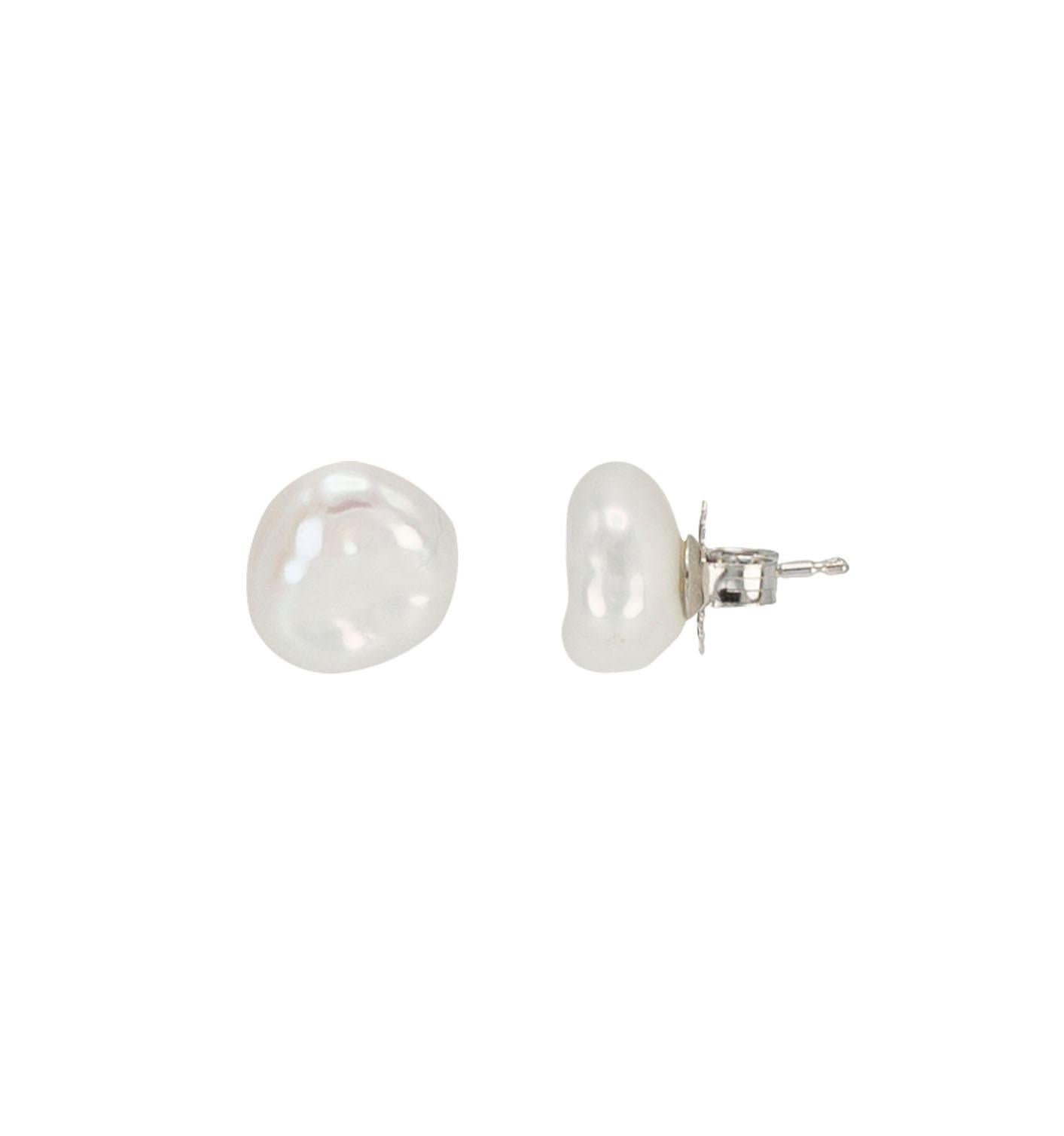 These stunning white Keshi pearl studs measure 8-9mm and feature 14K White Gold posts and backings. They are the perfect everyday stud that you can dress up or down!