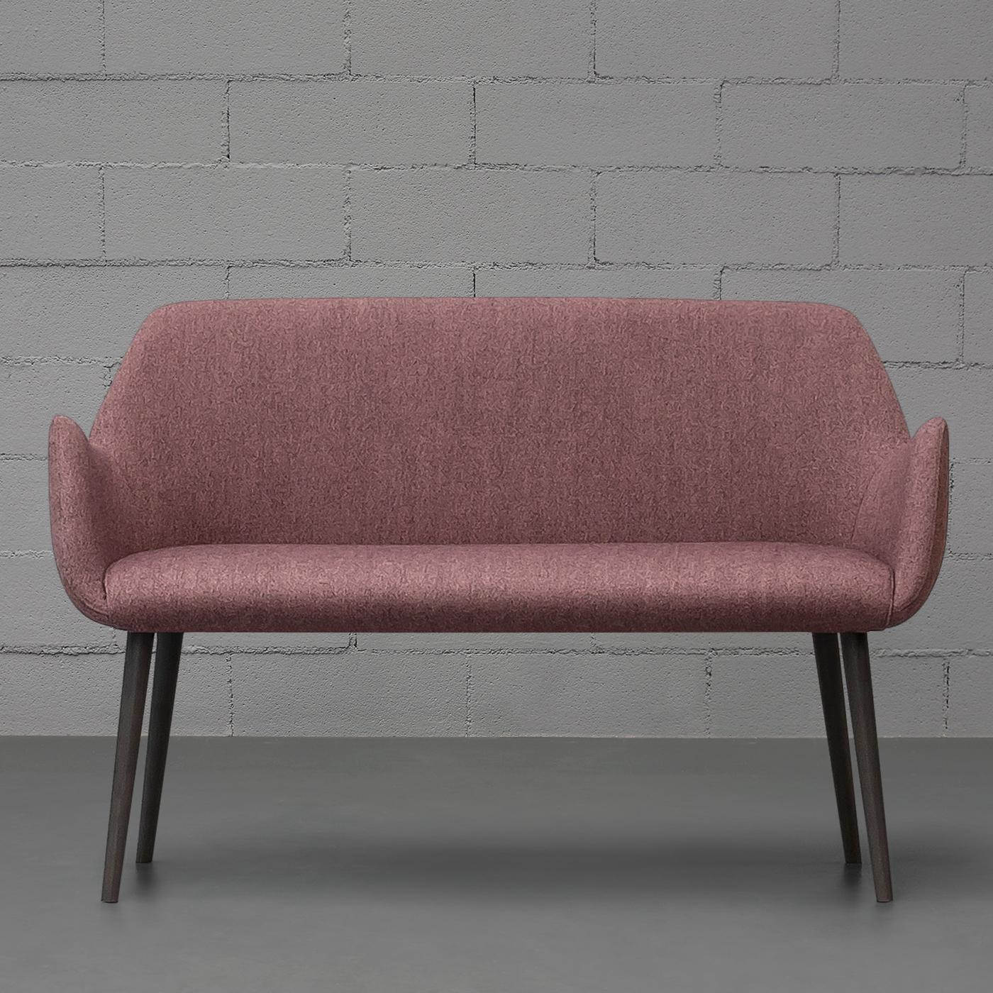 Part of the Kesy Collection, this magnificent loveseat designed by industrial designer team Carlesi & Tonelli is a superb addition to a contemporary interior decor. The elegantly outlined silhouette rests on wenge-stained ash wood legs and features