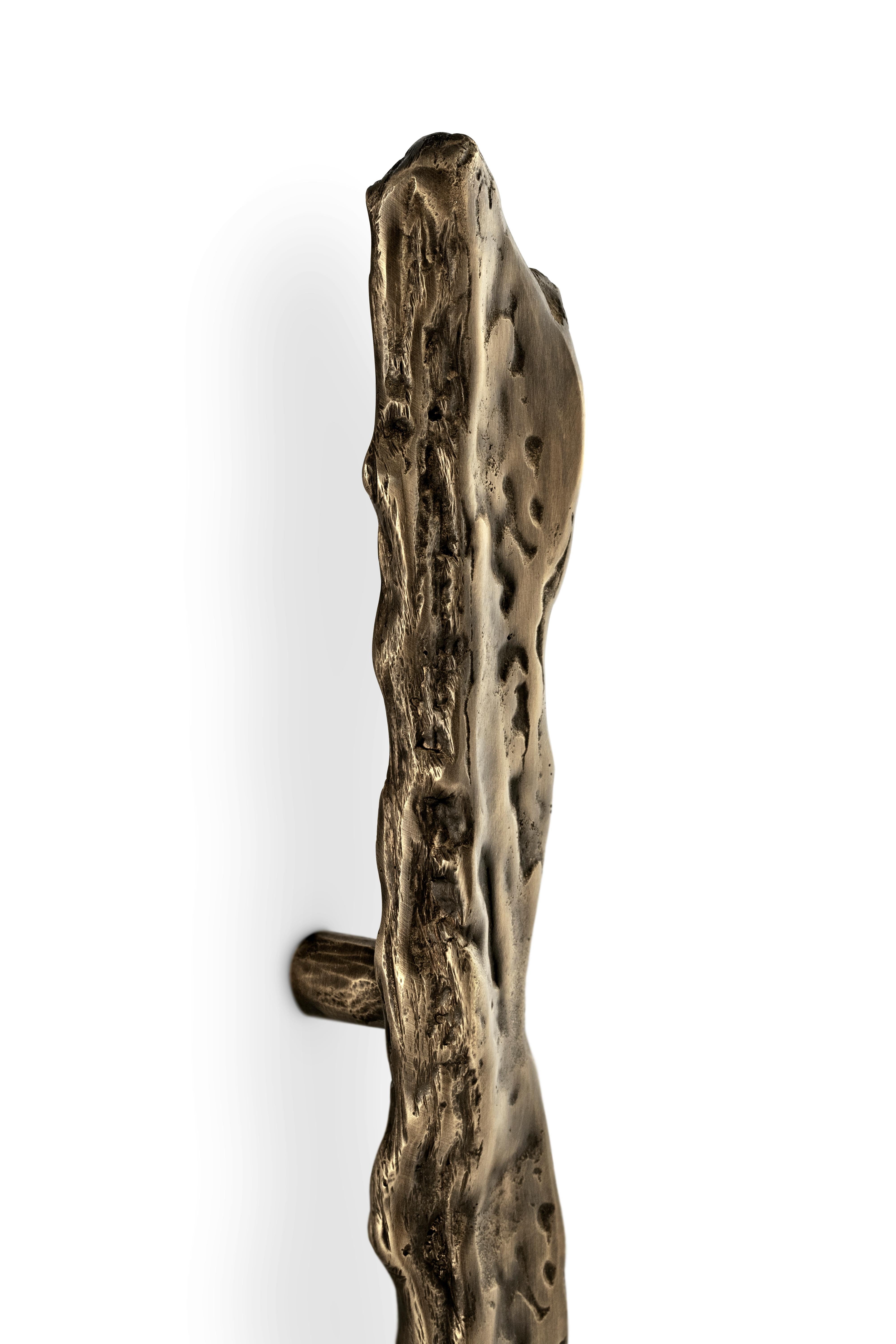 Our Inspiration for the Kesya Door Hardware was drawn from the very uneven texture of the bark pine tree, known for its endless evergreen. Honoring the past and ancient roots but evoking prosperity, this distinguished Big-Size Door Pull enables you