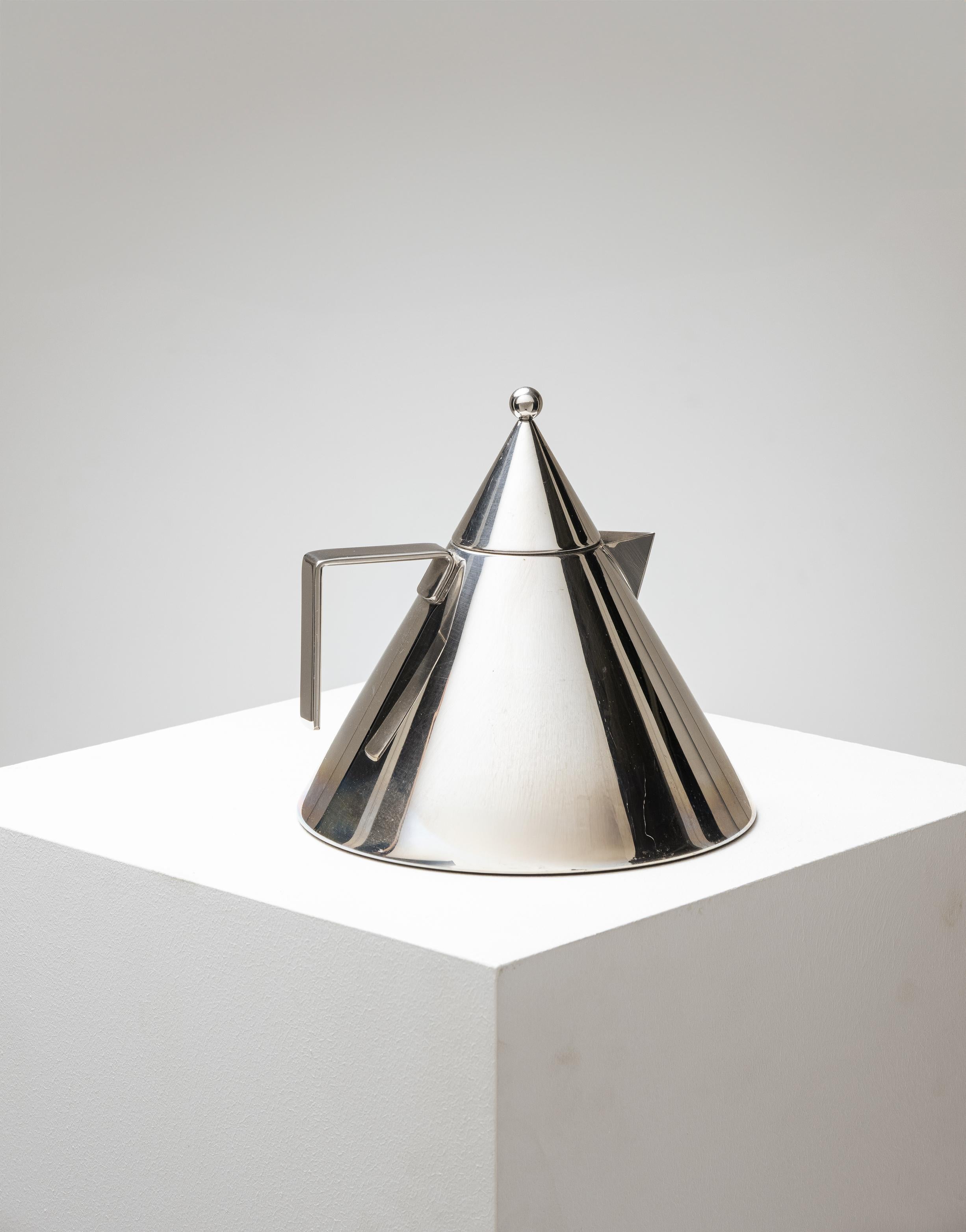 Designed by Italian architect Aldo Rossi in the 1980s for Alessi, this iconic kettle stands out for its clean, conical silhouette inspired by classical architectural forms. Made of polished stainless steel, it combines functionality with formal
