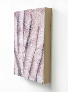 Hide #2- intricate collage of torn and pasted photograph of hands on wood panel