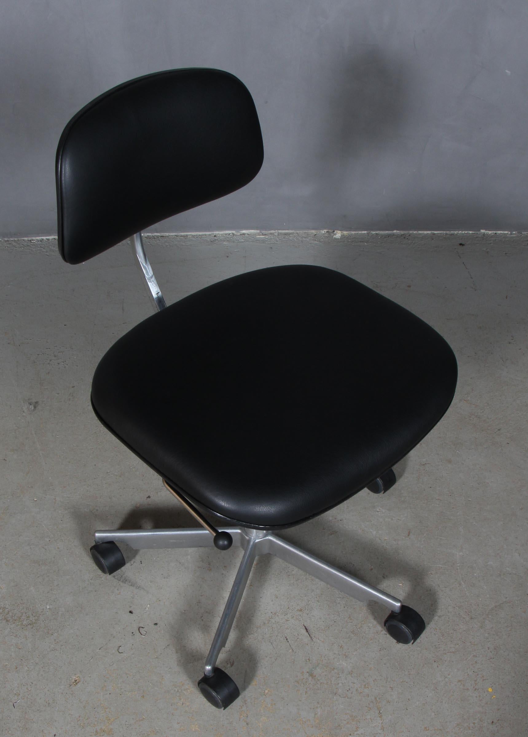 Kevi office chair designed by Jørgen Rasmussen. With height, tilt and other adjustments. 

New upholstered with black aniline leather.