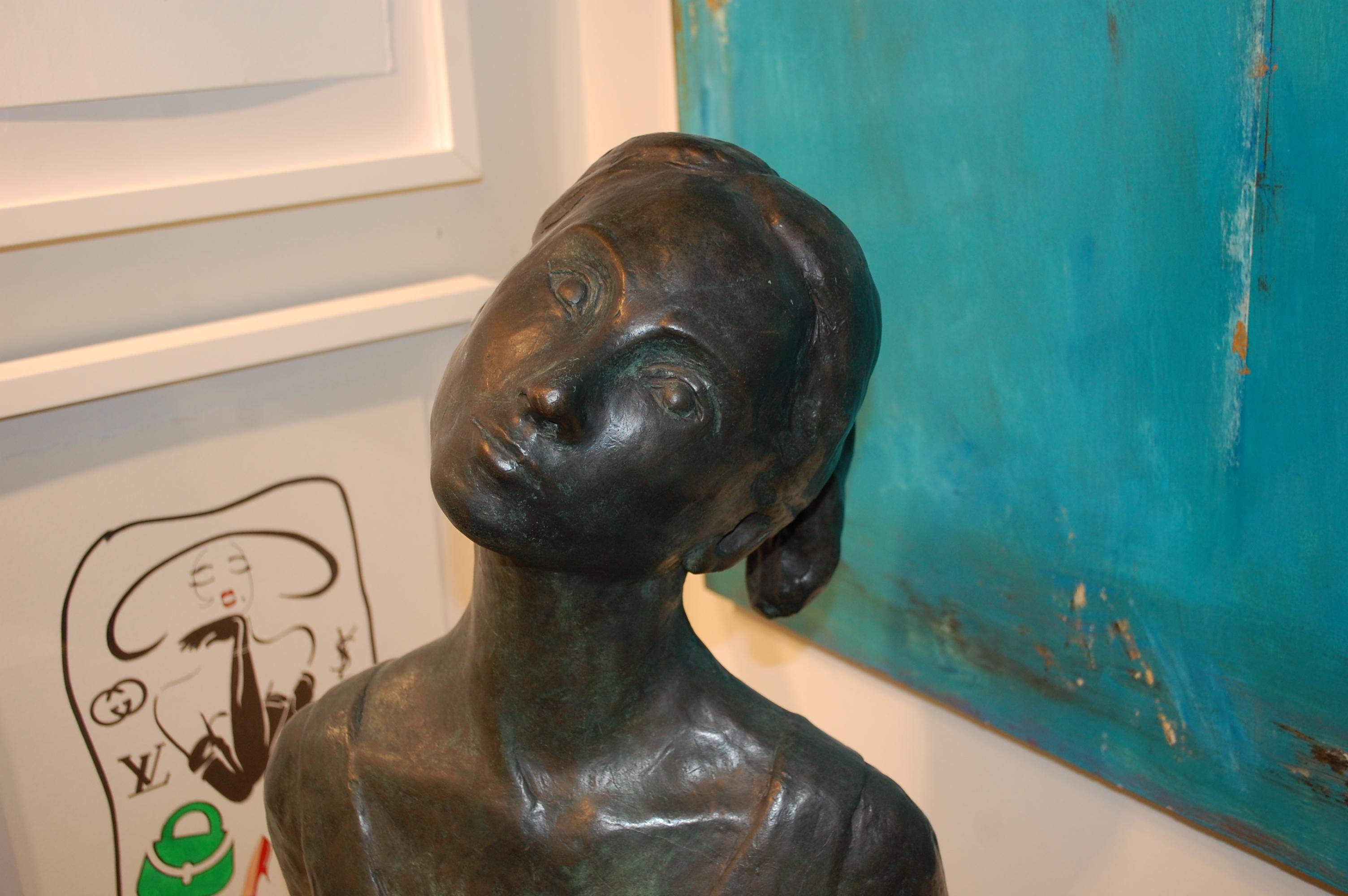 Bust Of A Young Woman 
Bronze sculpture signed by the artist inside the cast and dated 1988, 1st cast in London.

Kevin Berlin is an international artist best known for painting, sculpture, and performance. Berlin currently lives in Southampton, New