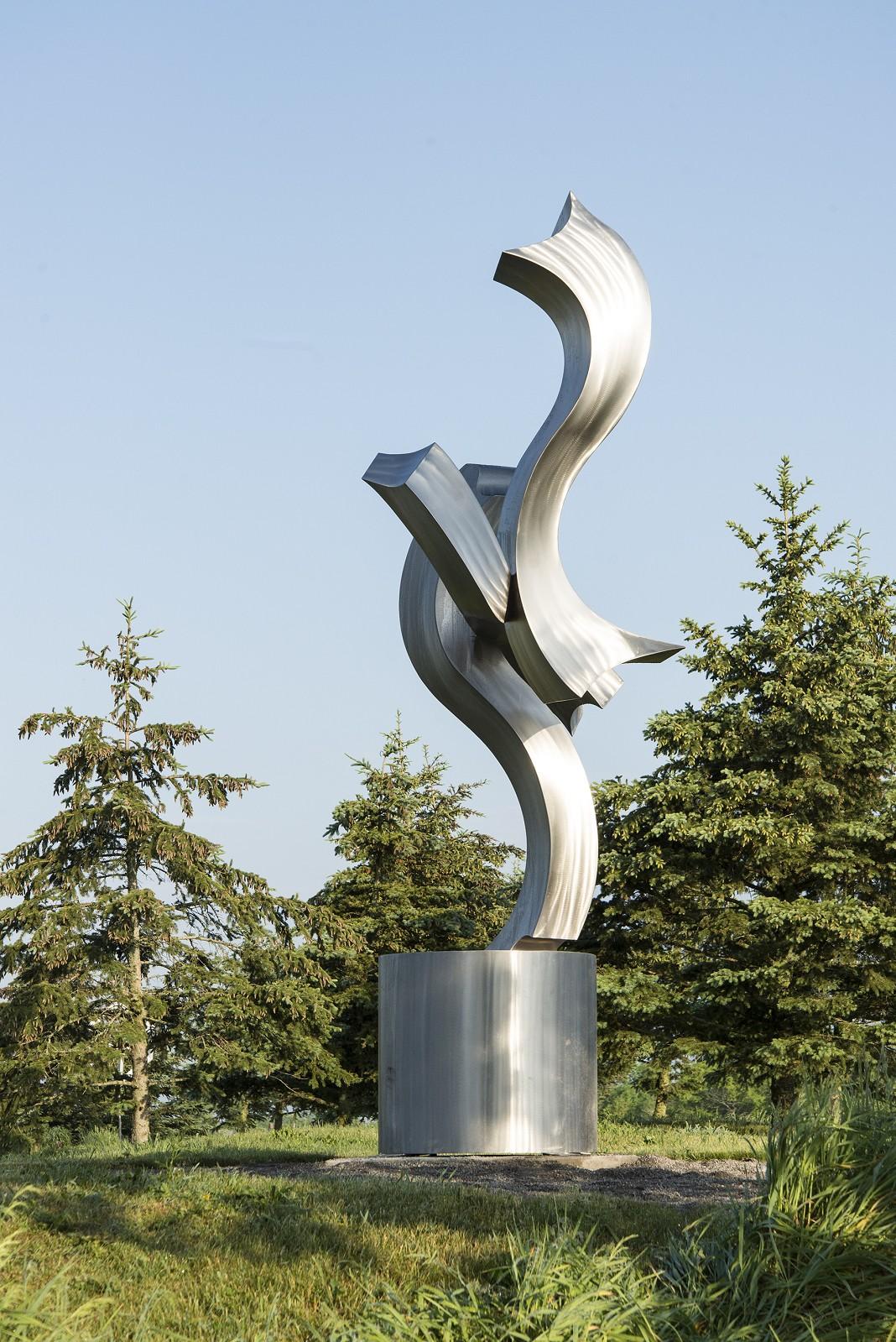 Soaring Embrace - rippling s-curved bands of stainless steel outdoor sculpture - Abstract Sculpture by Kevin Robb