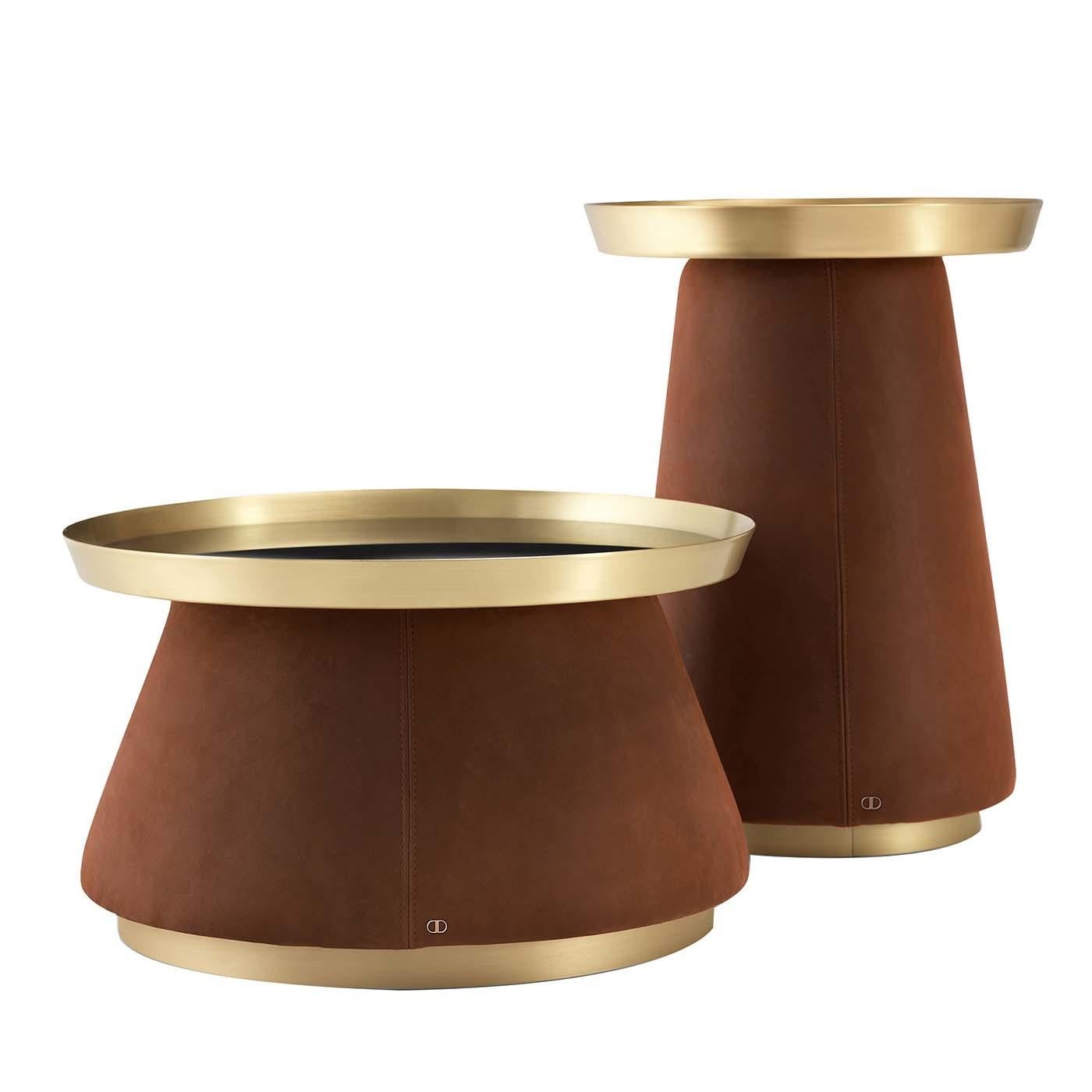This sophisticated set of two side tables will make a statement in both a contemporary and classic interior decor. This set comprises a tall table (ø 45 x h 60 cm) and a short, larger one (ø 60 x h 35 cm), each featuring a multilayered wooden base