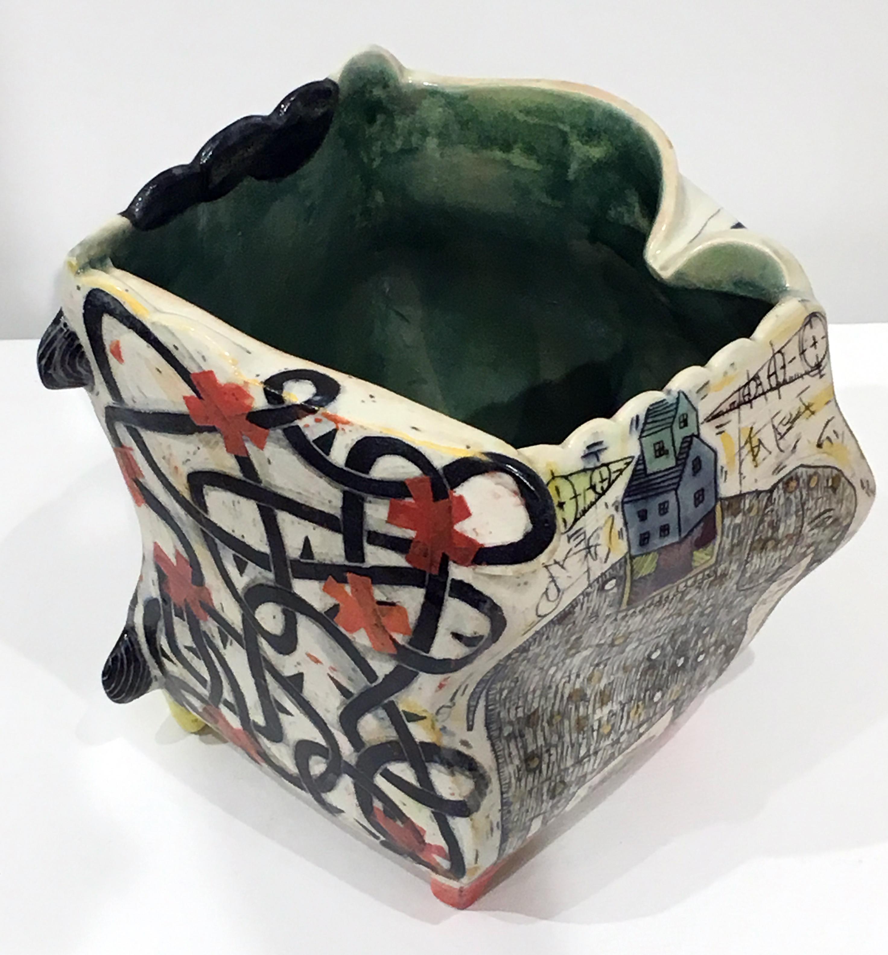 Kevin Snipes creates ceramic vessel forms that act as canvases for self referential narratives that are brought to the viewer through a combination of illustration and symbolism, obscure glyphs, and comical/whimsical motifs. Within the discipline of