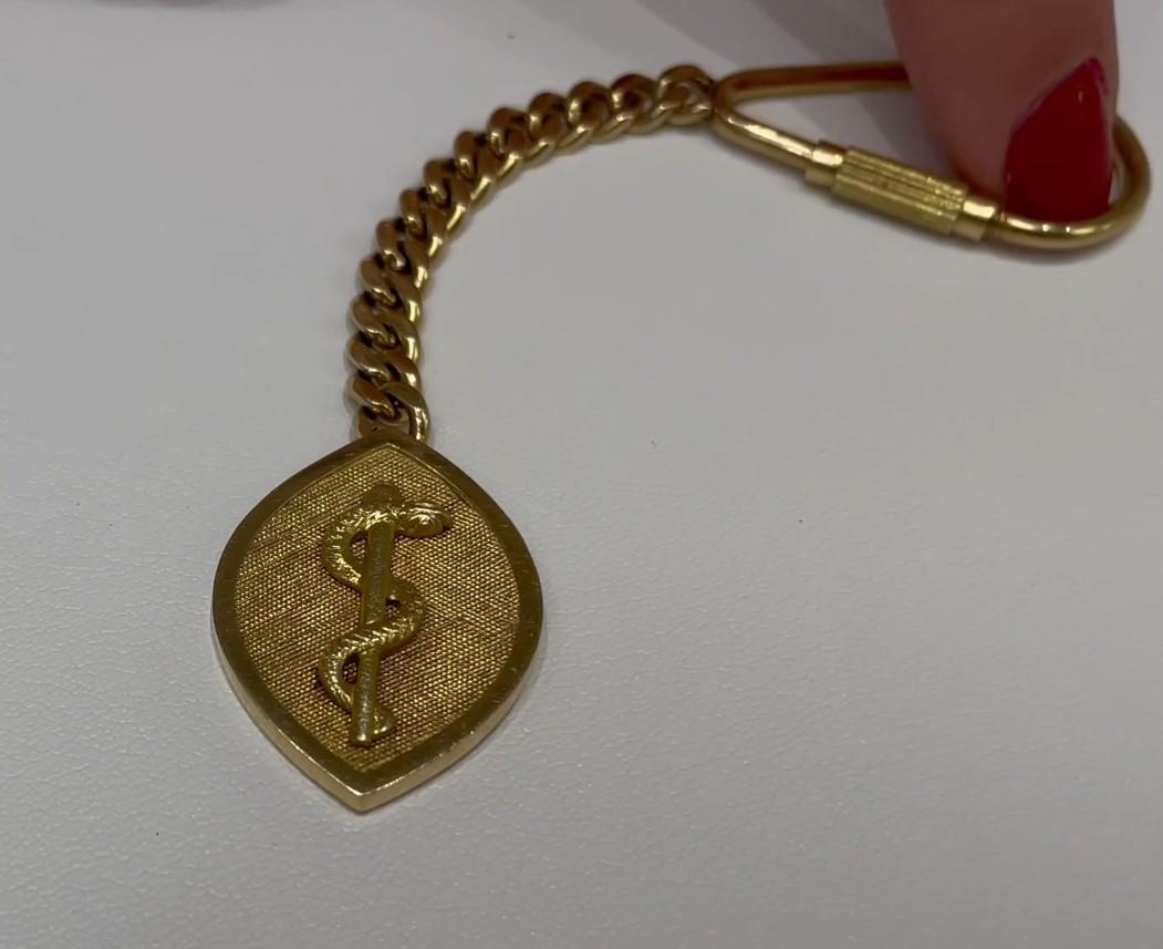 rod of asclepius gold