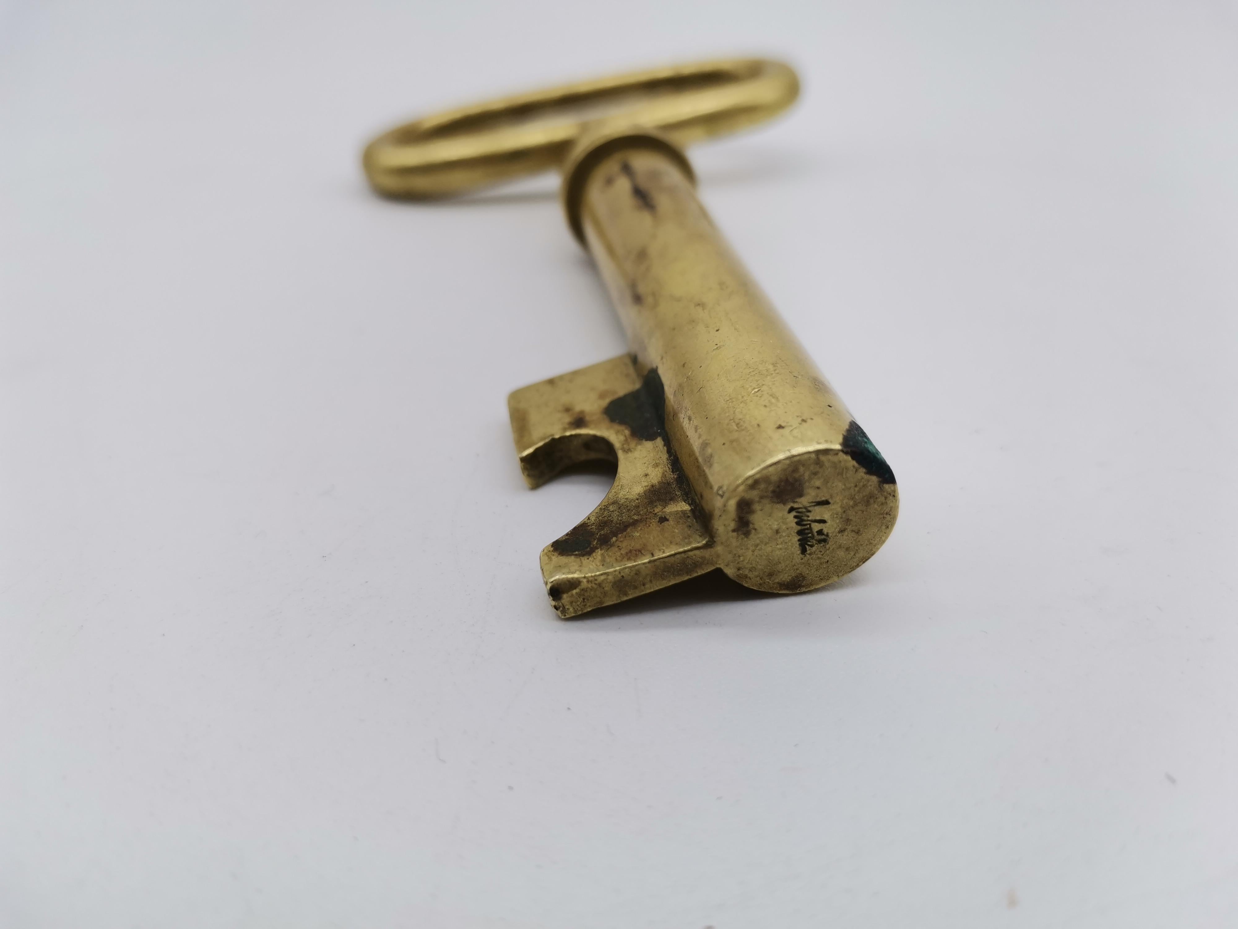 A cork screw in shape of a key by Carl Auböck.