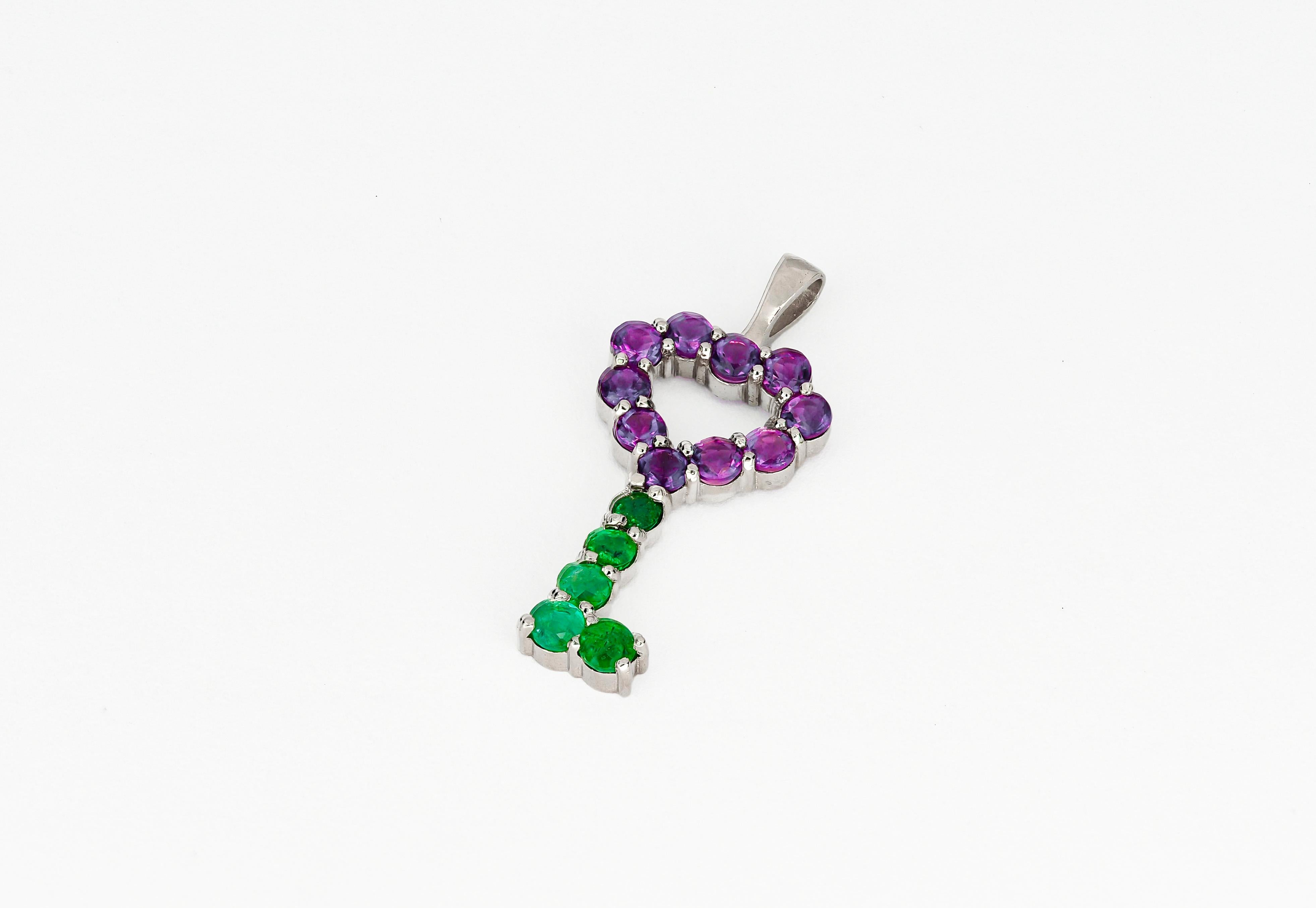 Modern Key pendant with Amethysts, emeralds.  For Sale