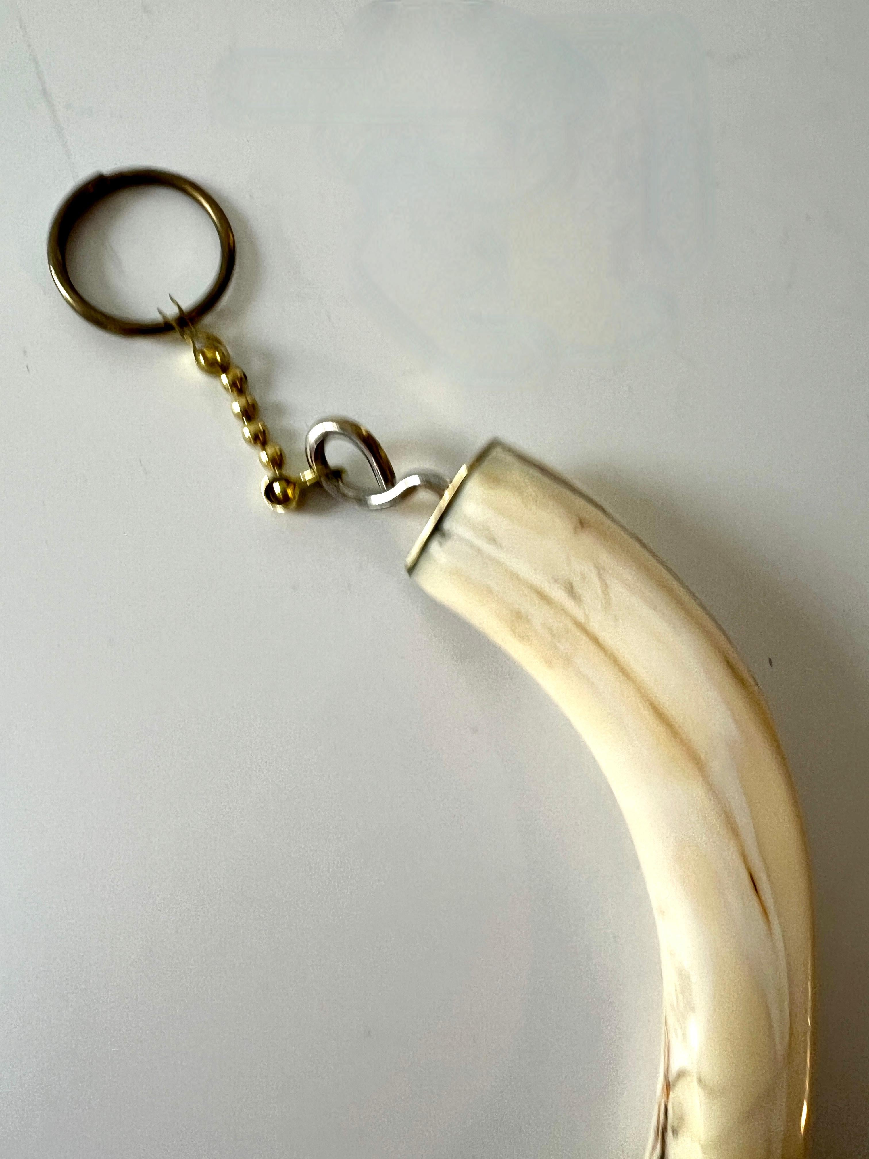 Hand-Crafted Key Ring with Attached Piece of Bone For Sale