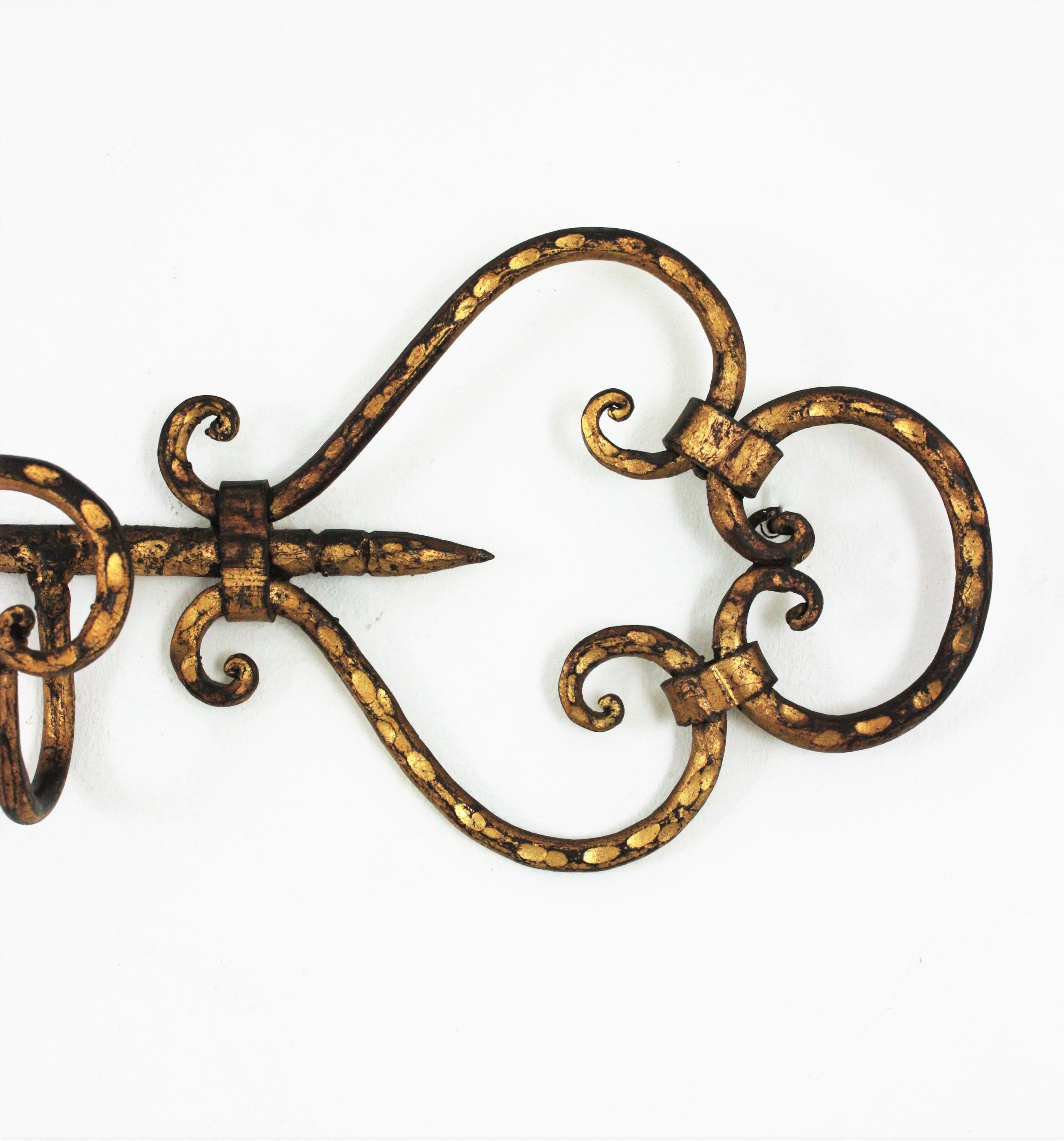 Spanish Wall Coat Rack with Key Shape, Wrought Gilt Iron For Sale
