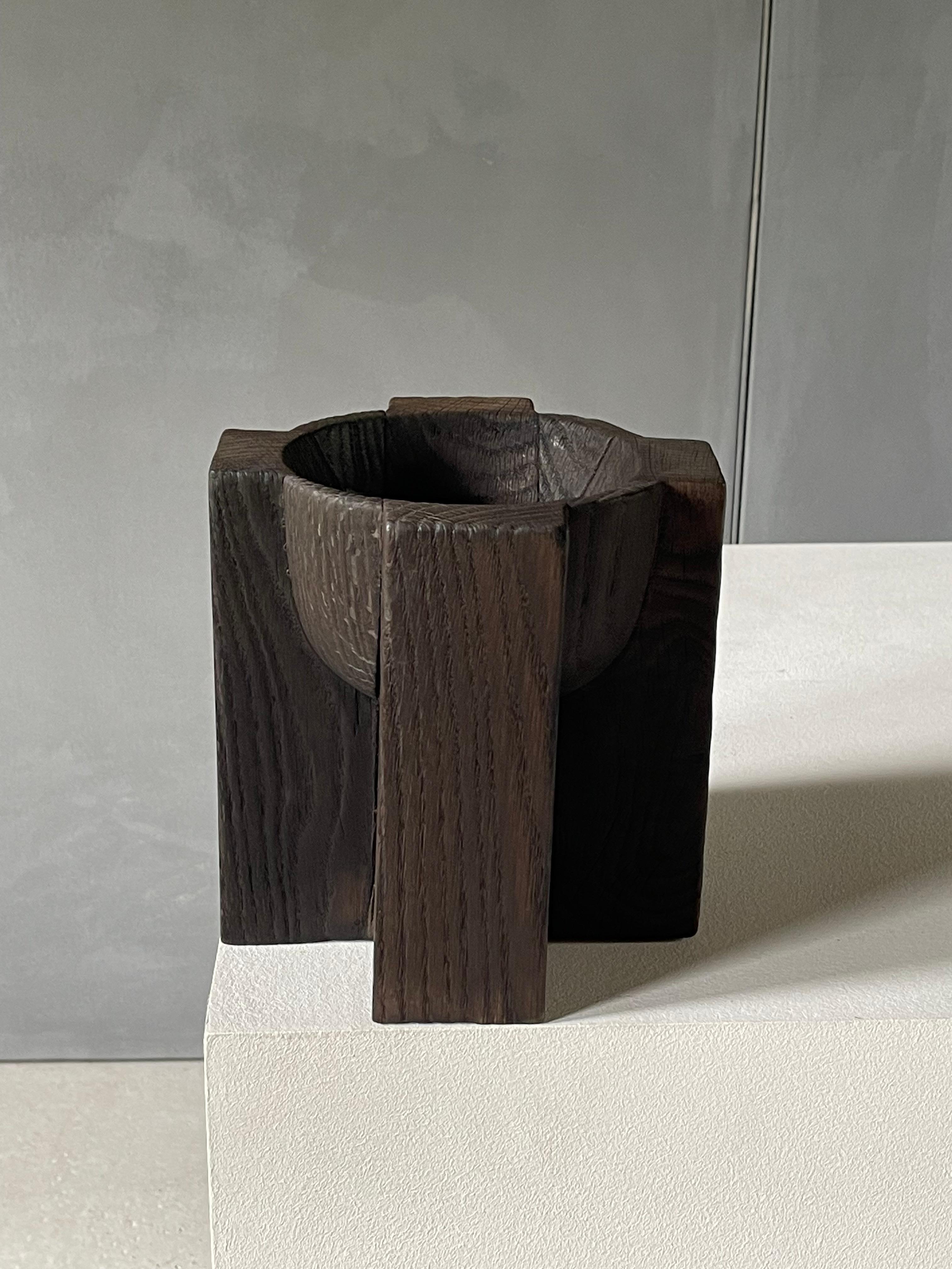 Key Tidy / Arno Declercq
2017 / Burnt Iroko Wood
20 x 20 x h20 cm

prototype (unique piece)

Mystical and minimalistic, precious and brutalist, tribal and poetic, « Key » evokes at the same time oblation, the palm of the hand and fine gesture.