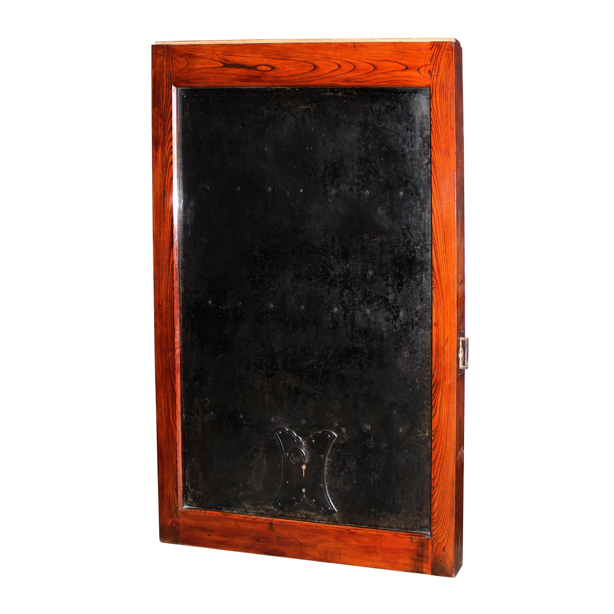 Keyaki wood warehouse door was used as the main door to a furniture warehouse in Kyoto, Japan. Keyaki wood with original metal and lockplate. Edo period, circa 1850s. Can use as the top of a large dining or coffee table with custom base or use as an