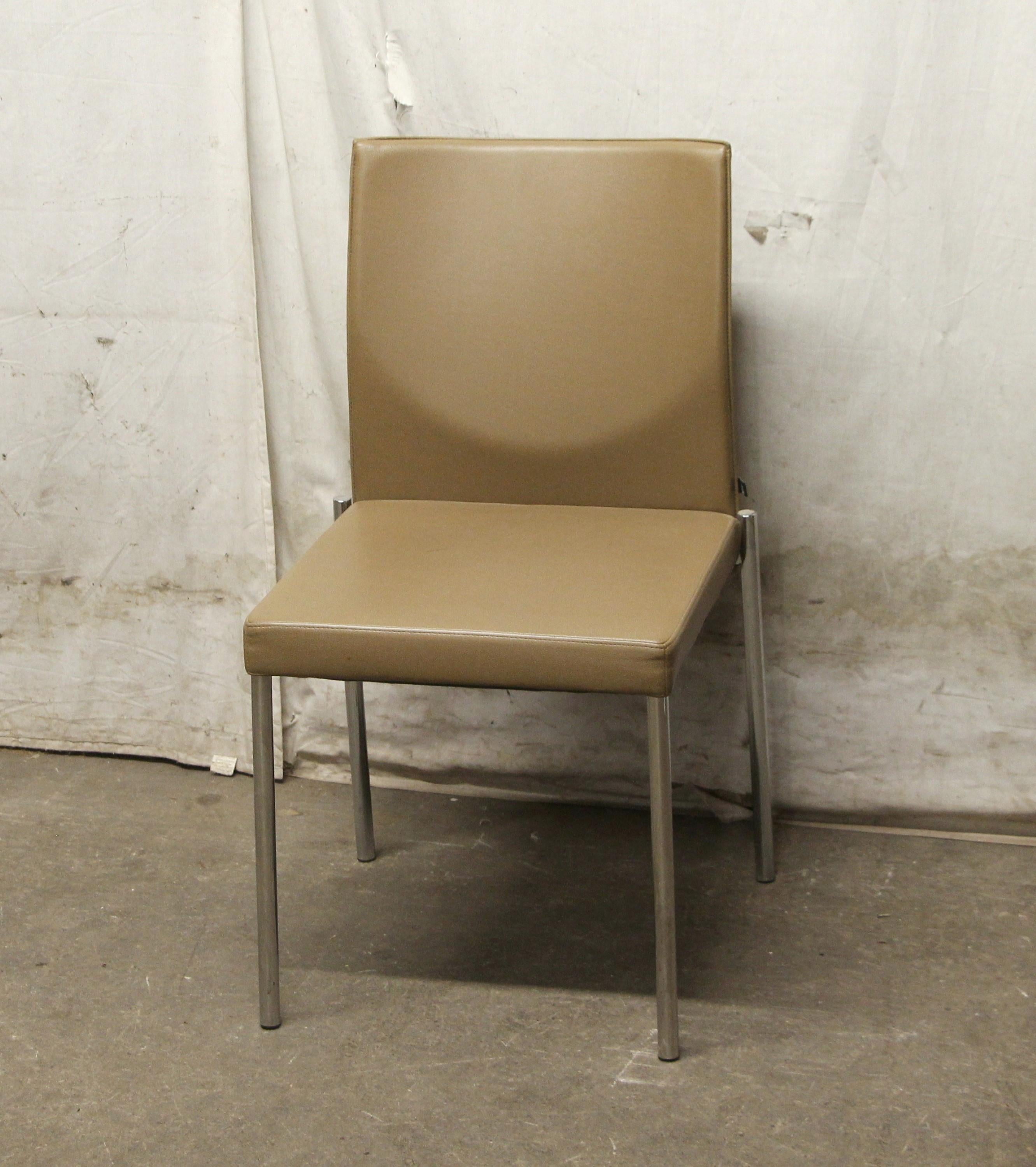 Glooh modern armless chair made by KFF (Karl-Friedrich Förster Design) with a sleek and comfortable design.  This German made chair, was originally used in a conference room setting.  It is light-weight and can also be in a dining or living room