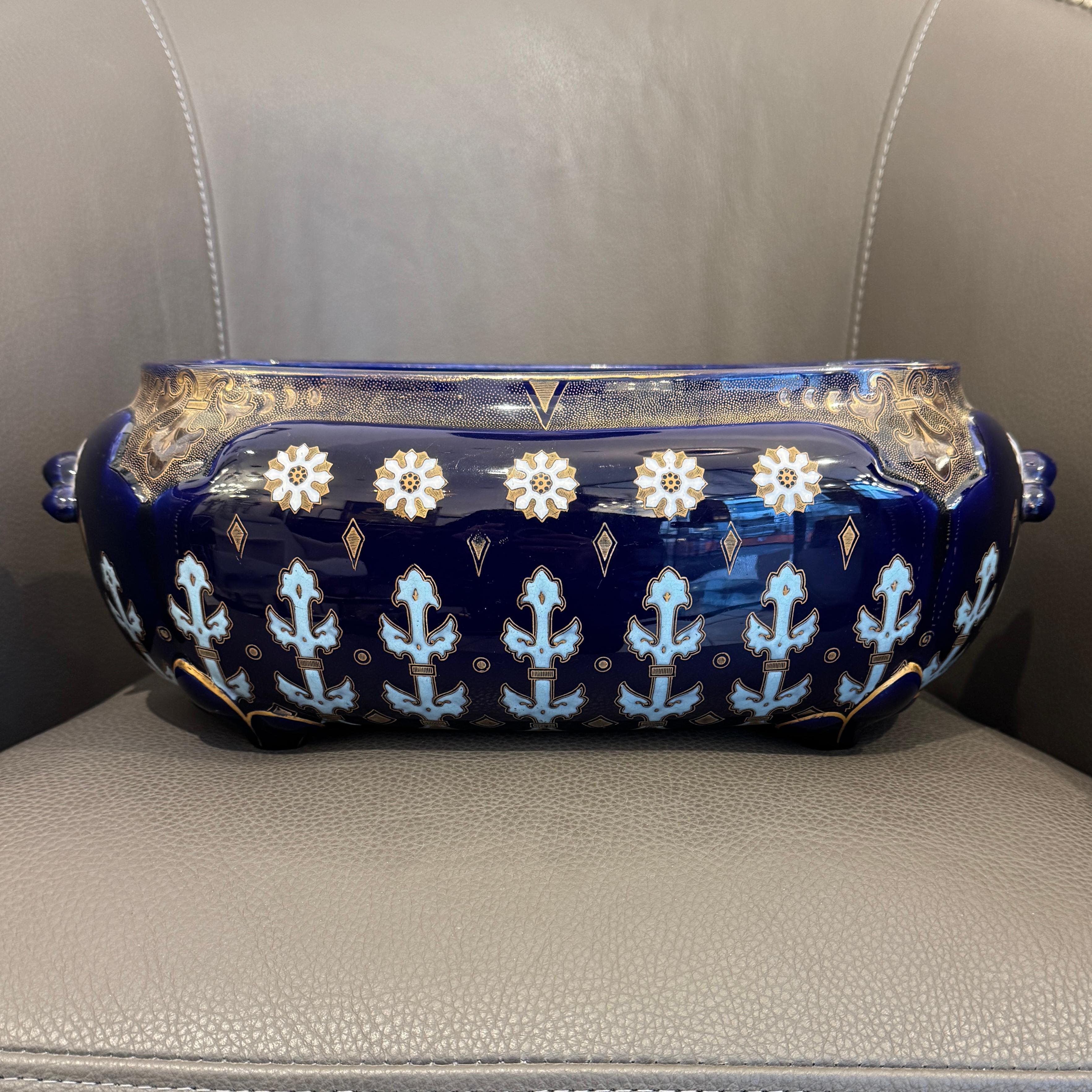 Presenting an exquisite and richly decorated ceramic planter or centerpiece from the celebrated manufactory, K. G. (Keller & Guérin) Luneville. This magnificent piece showcases the iconic 