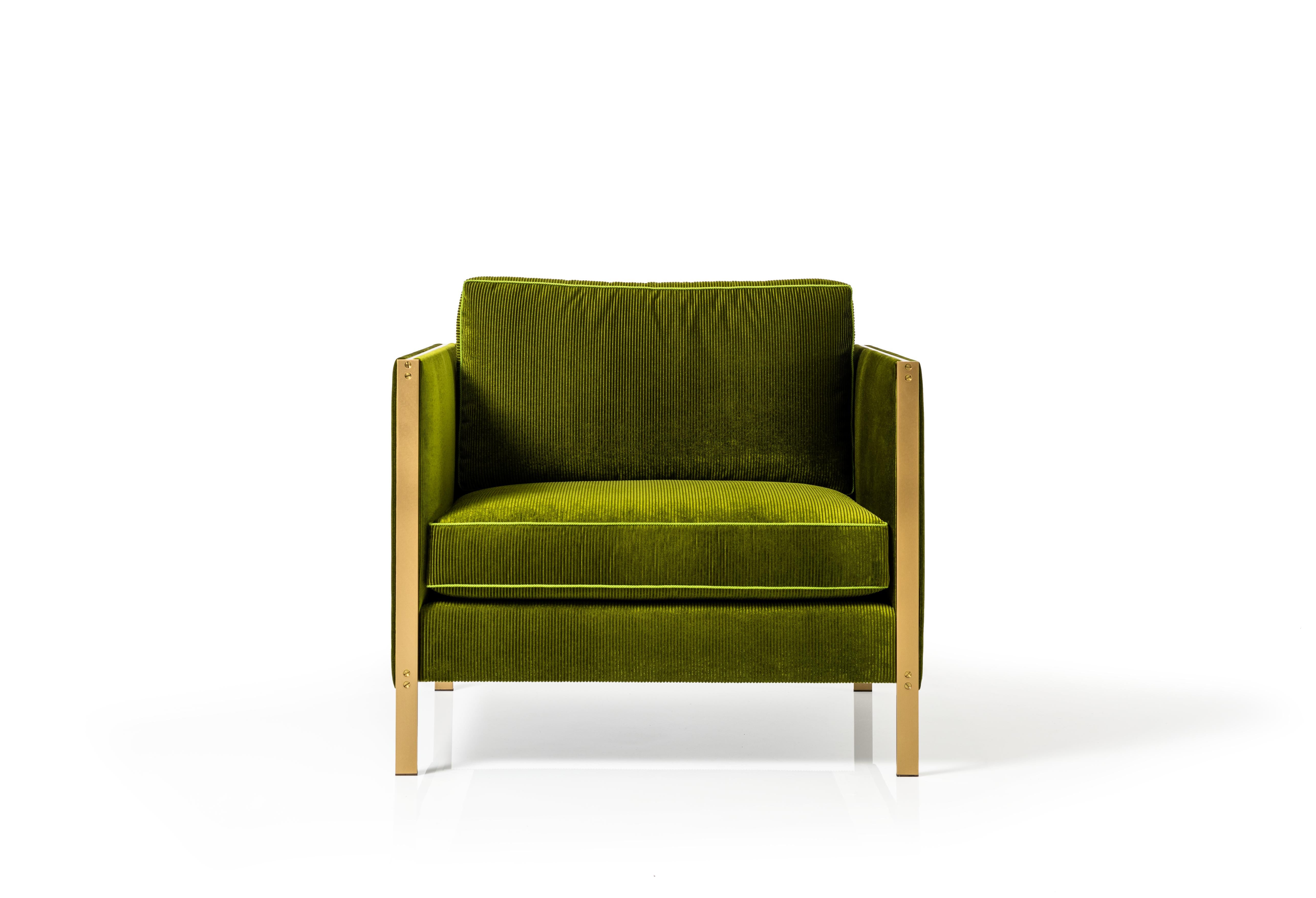 The architectural rigor of the Armstrong Armchair's mechanically fastened, metal frame forms a striking juxtaposition to the generously proportioned, down-filled seat and back cushions.

Shown with a Solid Brass frame and Emerald Green Corduroy. 

W