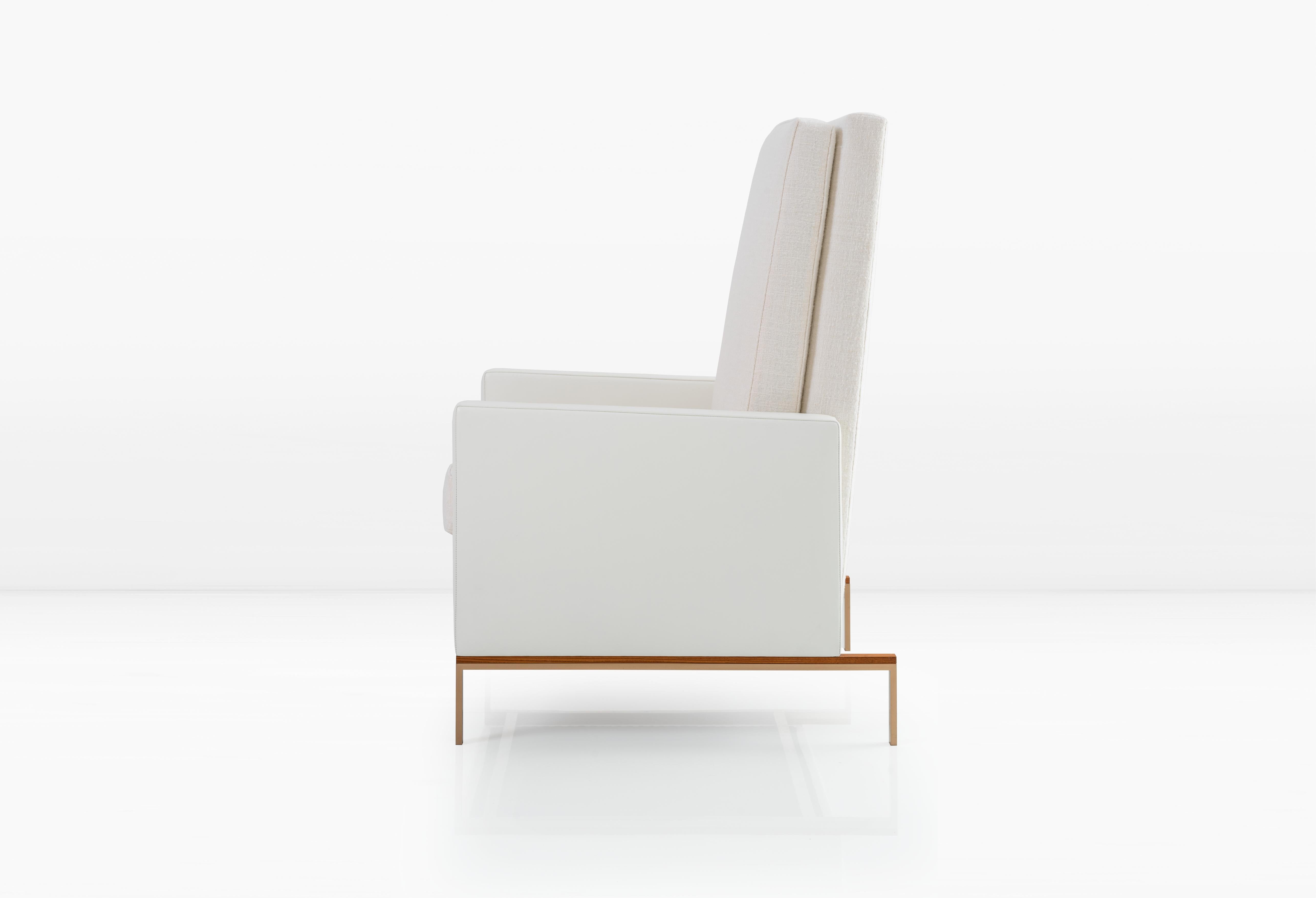 Merging architectural design with comfort, the Larkin Chair is made of white boucle and leather materials and a Silicon Bronze wooden base. 

W 27” x D 35” x H 47 ½”
Arm Height 24