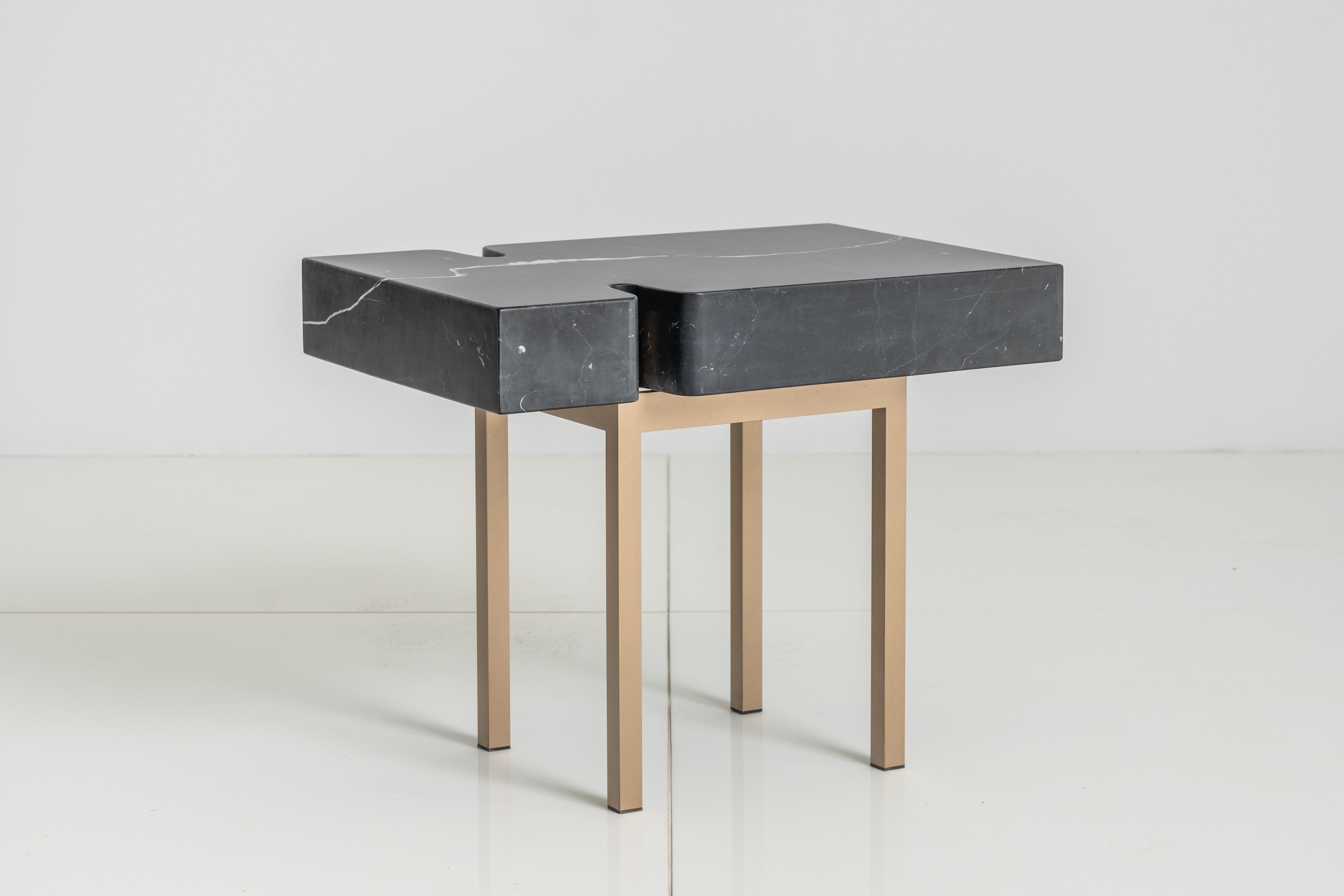 The Terranova Side Table comprises the obverse of its companion piece, the Terranova Coffee Table, allowing the delicate base to feature more prominently.

Each piece of marble is unique and may have different variations in design from what is