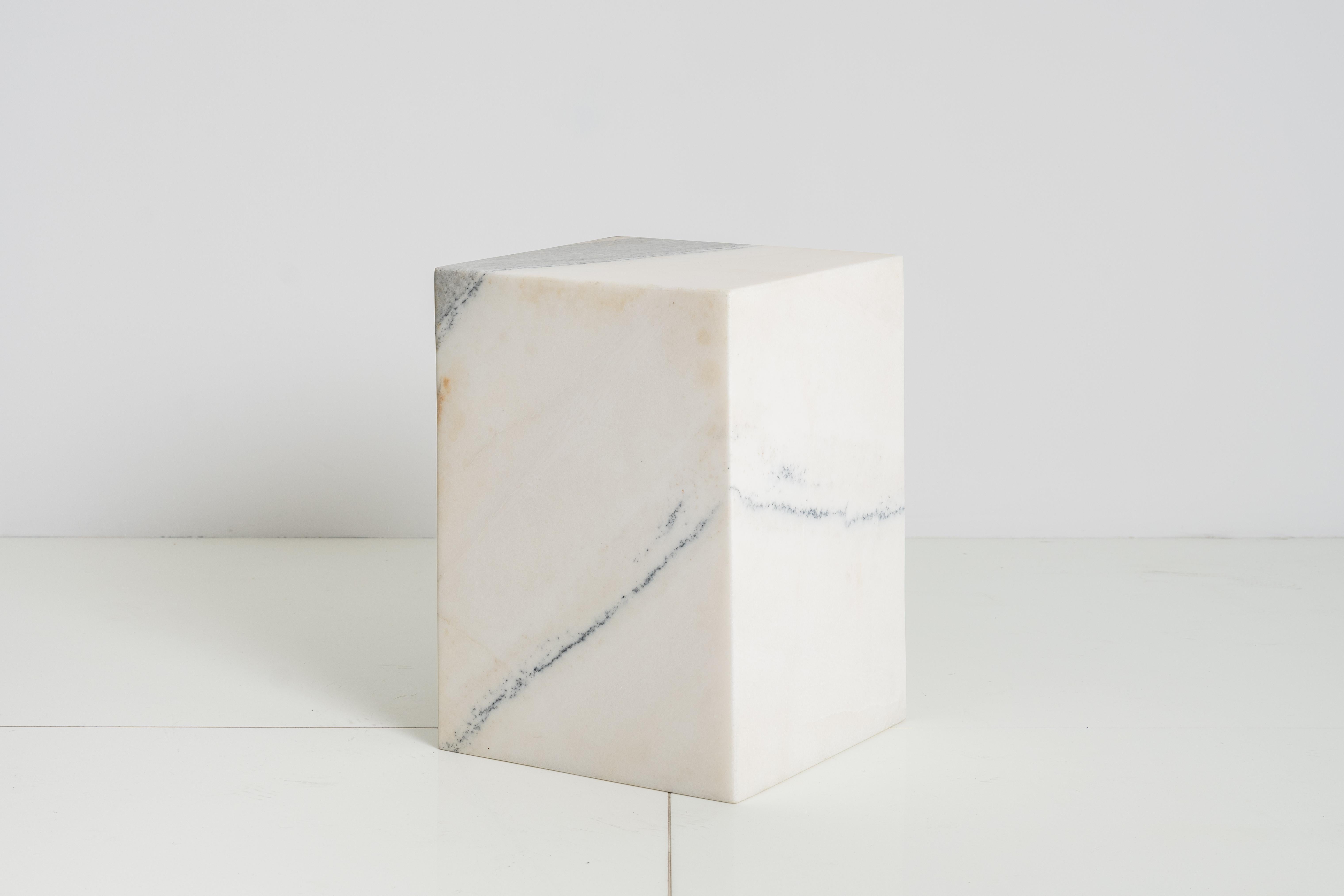 Two interlocking pieces of solid marble create the archetypal mass of the Terrell Side Table.

Each piece of marble is unique and may have different variations in design from what is pictured. This is the beauty of the product and makes it unique