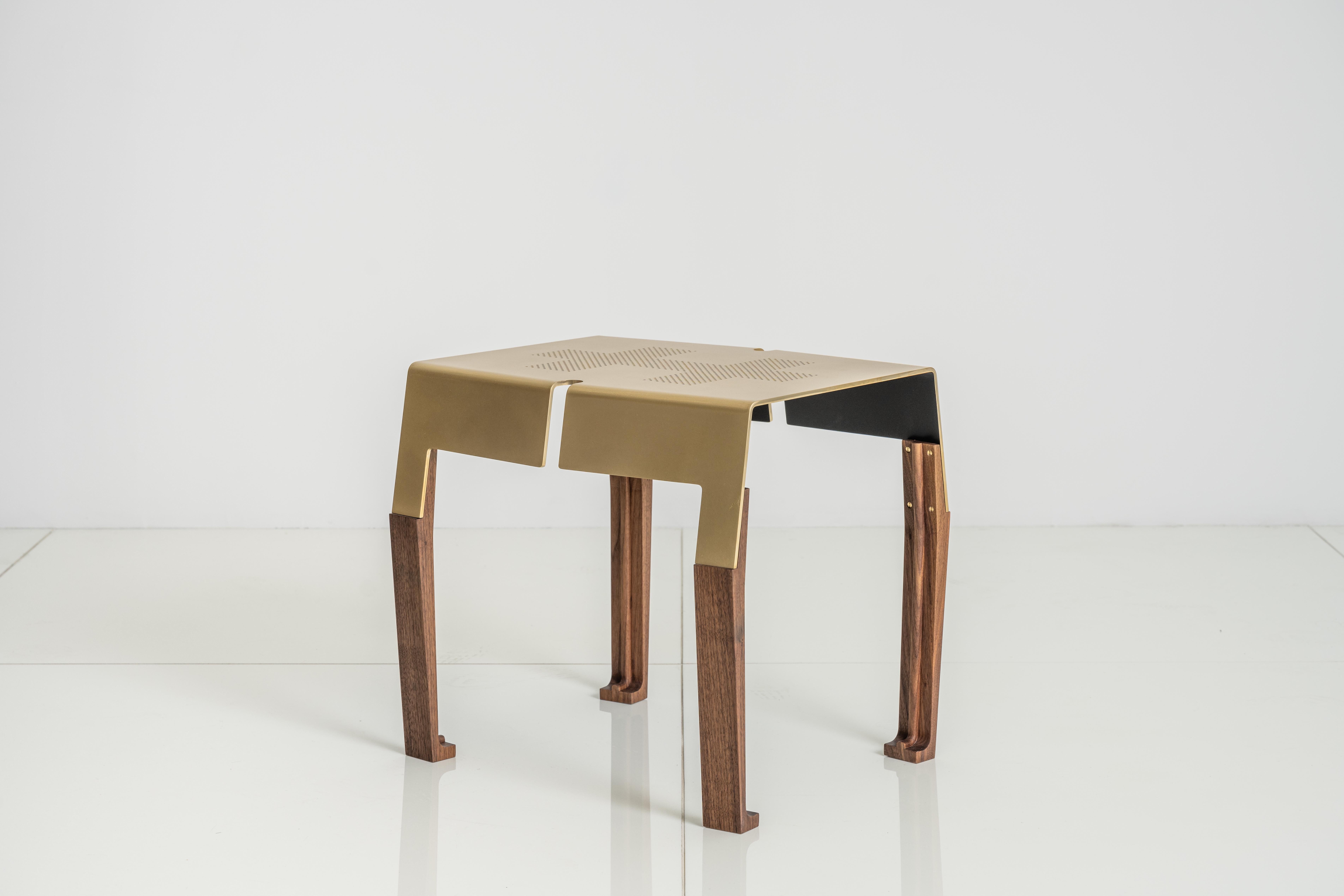 The Tunney 2.0 side table features a solid brass plate top with walnut legs.

This is a natural product that may have slight imperfections. This is the beauty of the product and makes it unique from other items out there on the market.