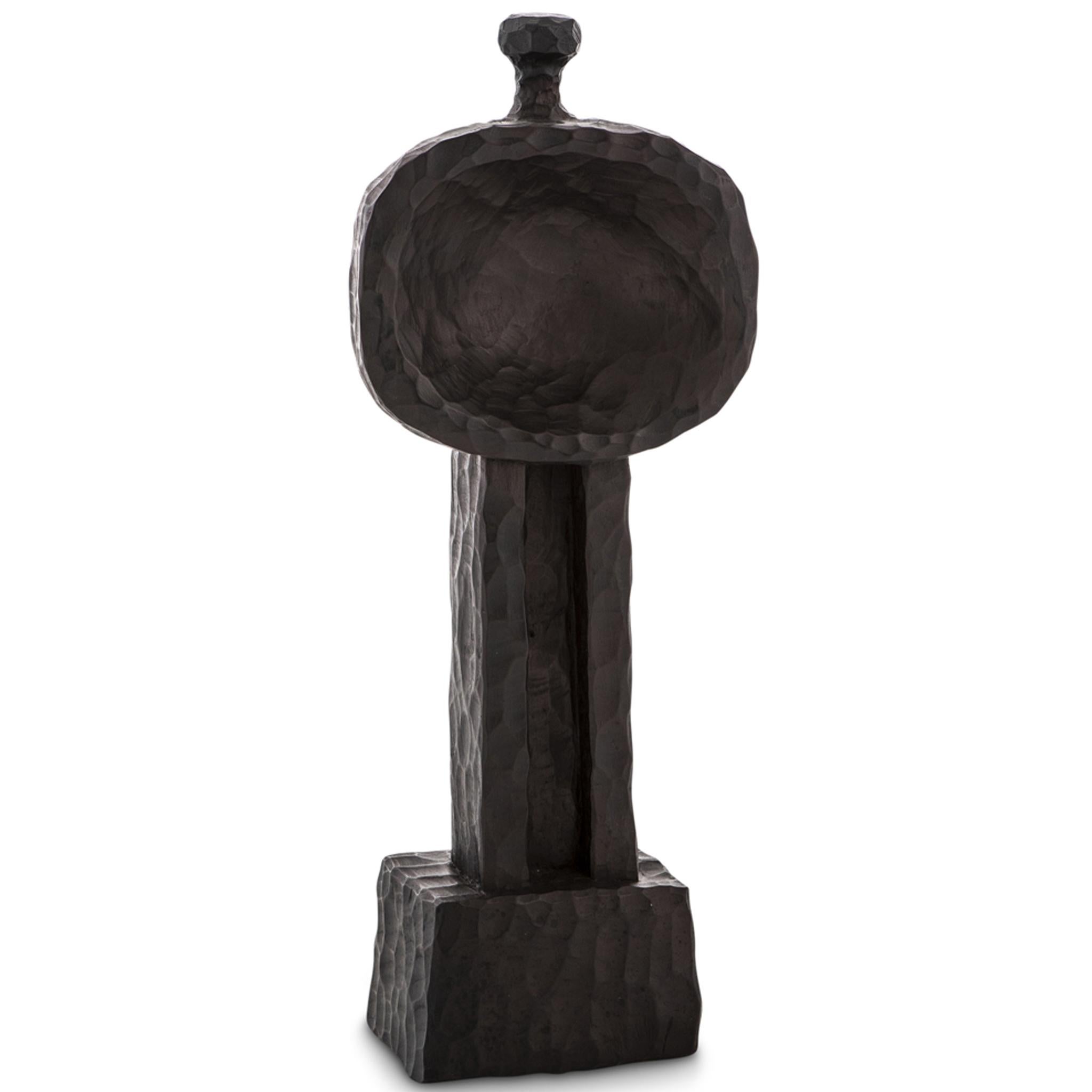 The Khada Totem Sculpture #3 is hand-carved in Southern Africa from sustainable alien timber by a collective of Zimbabwean artisans, who set their own prices, ensuring each piece is fair trade. 
These sculptural forms evoke a primal, brutalist