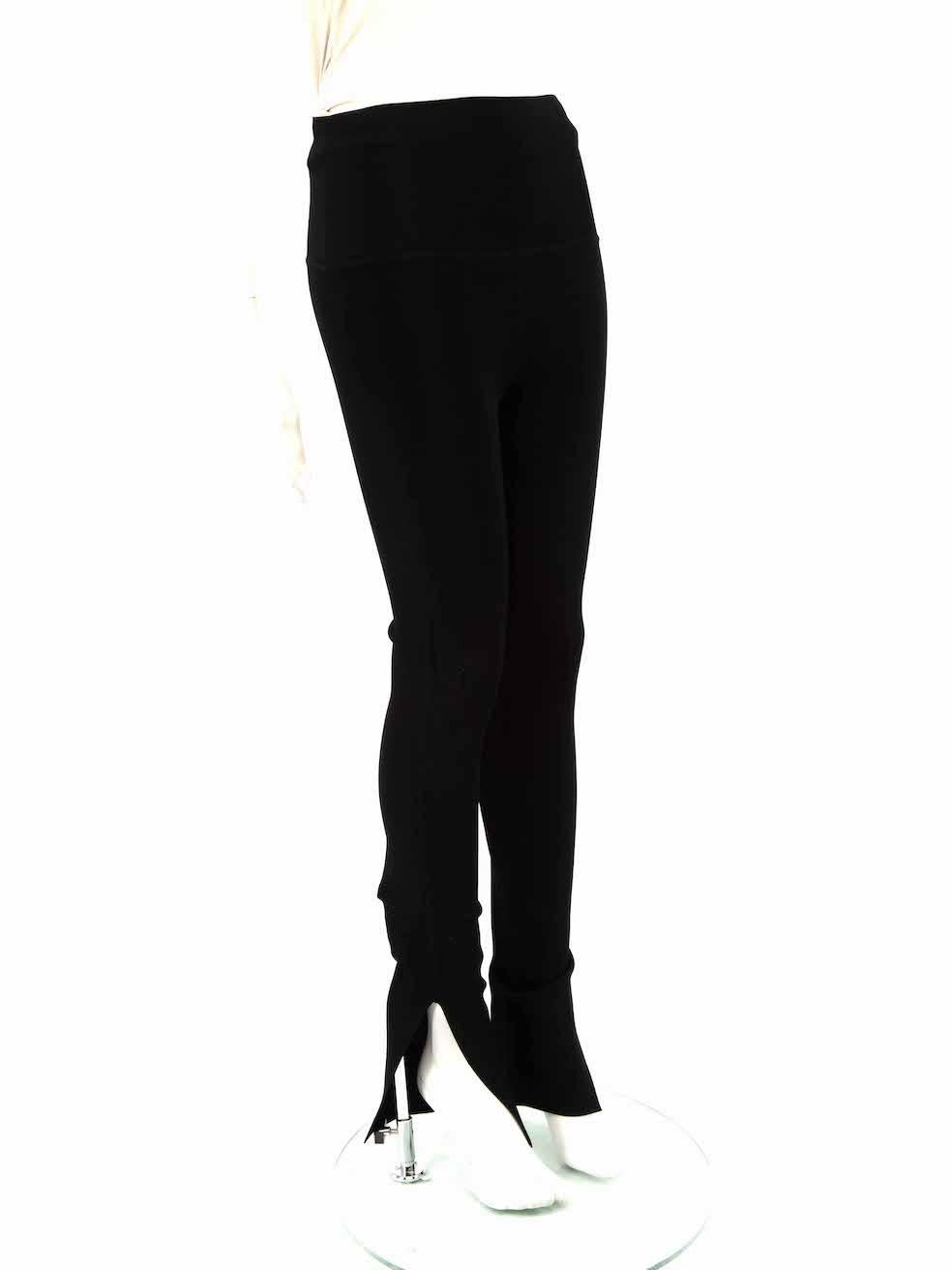 CONDITION is Very good. Hardly any visible wear to trousers is evident on this used Khaite designer resale item.
 
 
 
 Details
 
 
 Black
 
 Viscose
 
 Leggings
 
 High rise
 
 Stretchy
 
 Slit on the cuffs
 
 
 
 
 
 Made in Mongolia
 
 
 
