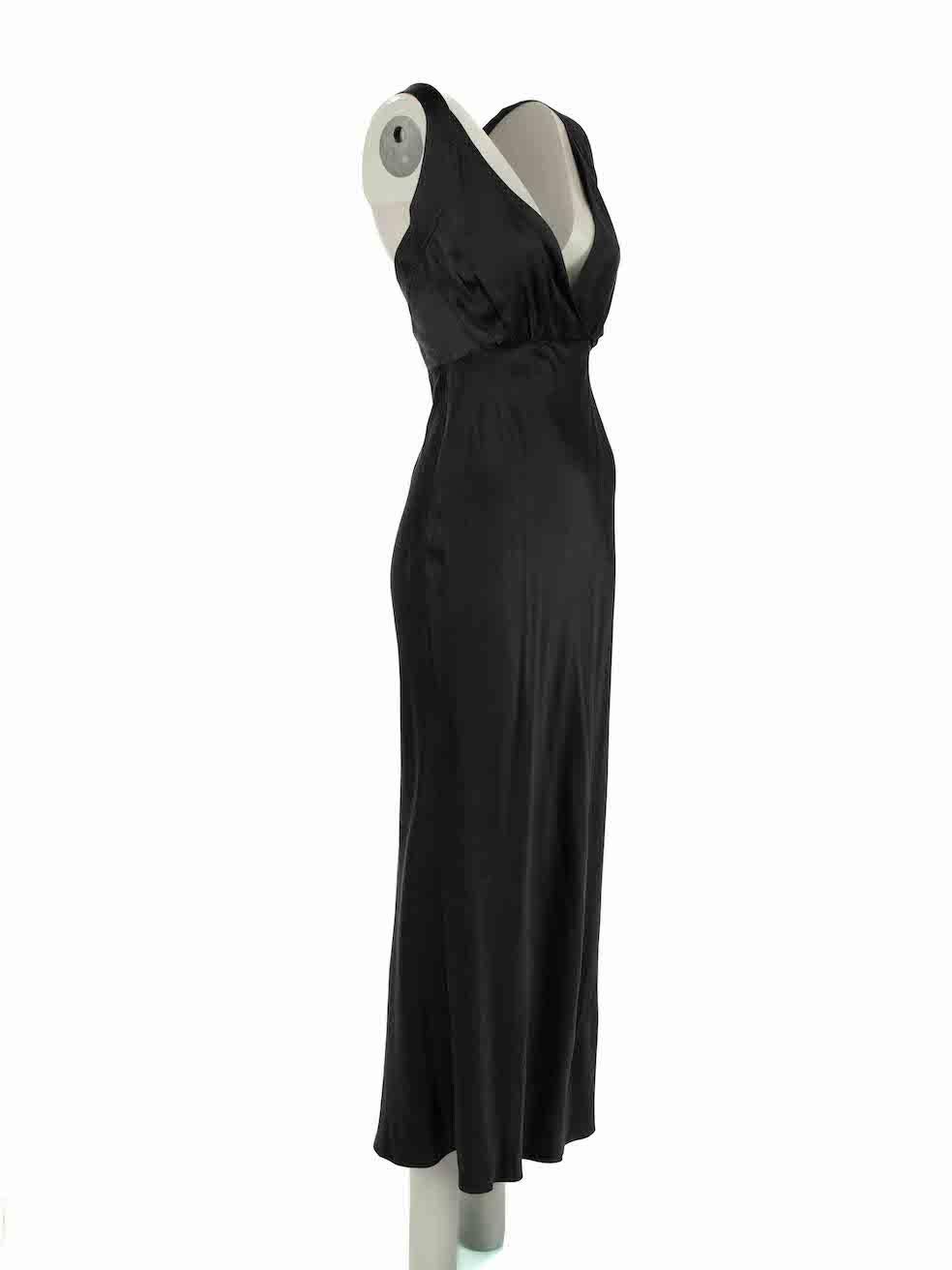 CONDITION is Very good. Minimal wear to dress is evident. Minimal wear to the silk with light discolouration all over on this used Khaite designer resale item.
 
Details
Black
Silk
Dress
Sleeveless
V-neck
Side button fastening
 
Made in