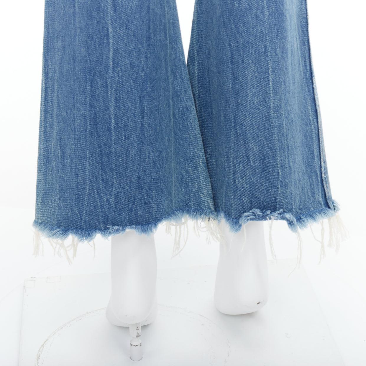 KHAITE Gabbie Blaue stein gewaschene Harz-Jeans mit Knopfleiste in Kurzform mit Knopfleiste 25