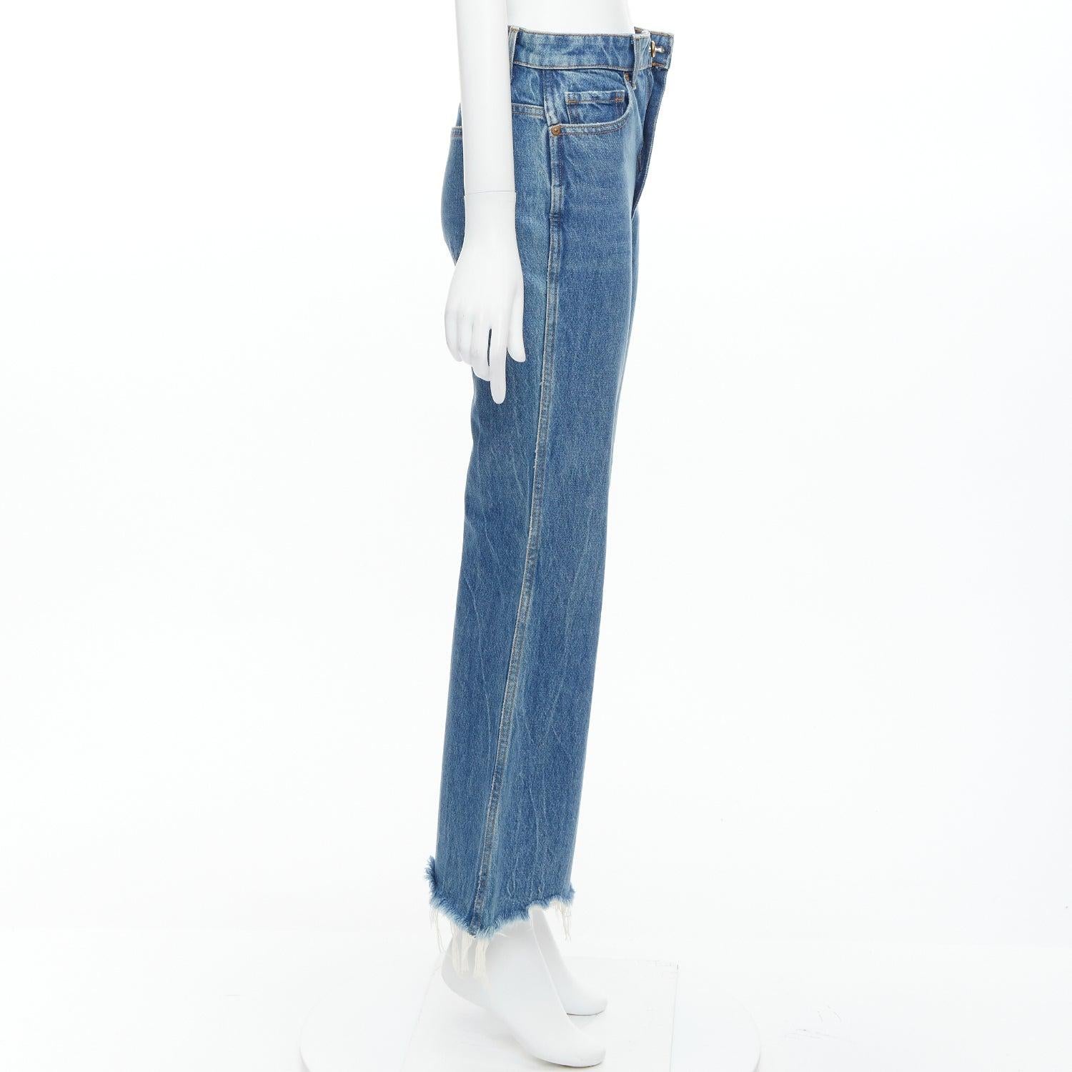 KHAITE Gabbie Blaue stein gewaschene Harz-Jeans mit Knopfleiste in Kurzform mit Knopfleiste 25