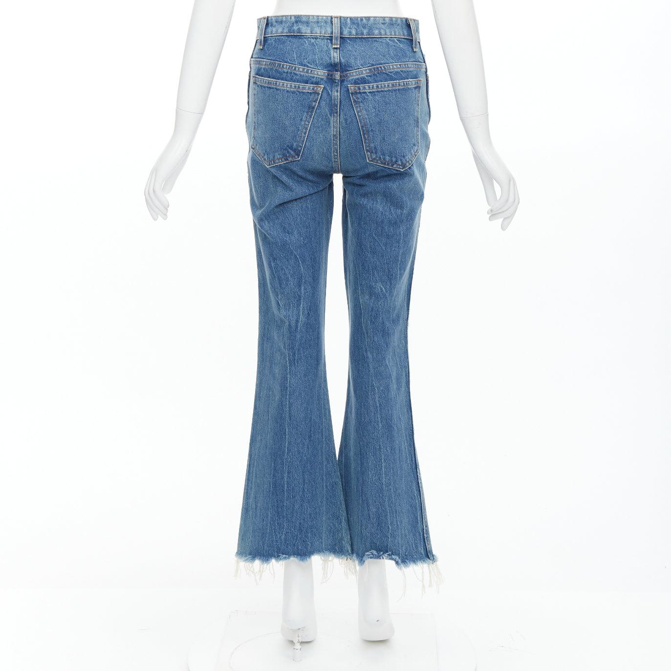 KHAITE Gabbie Blaue stein gewaschene Harz-Jeans mit Knopfleiste in Kurzform mit Knopfleiste 25