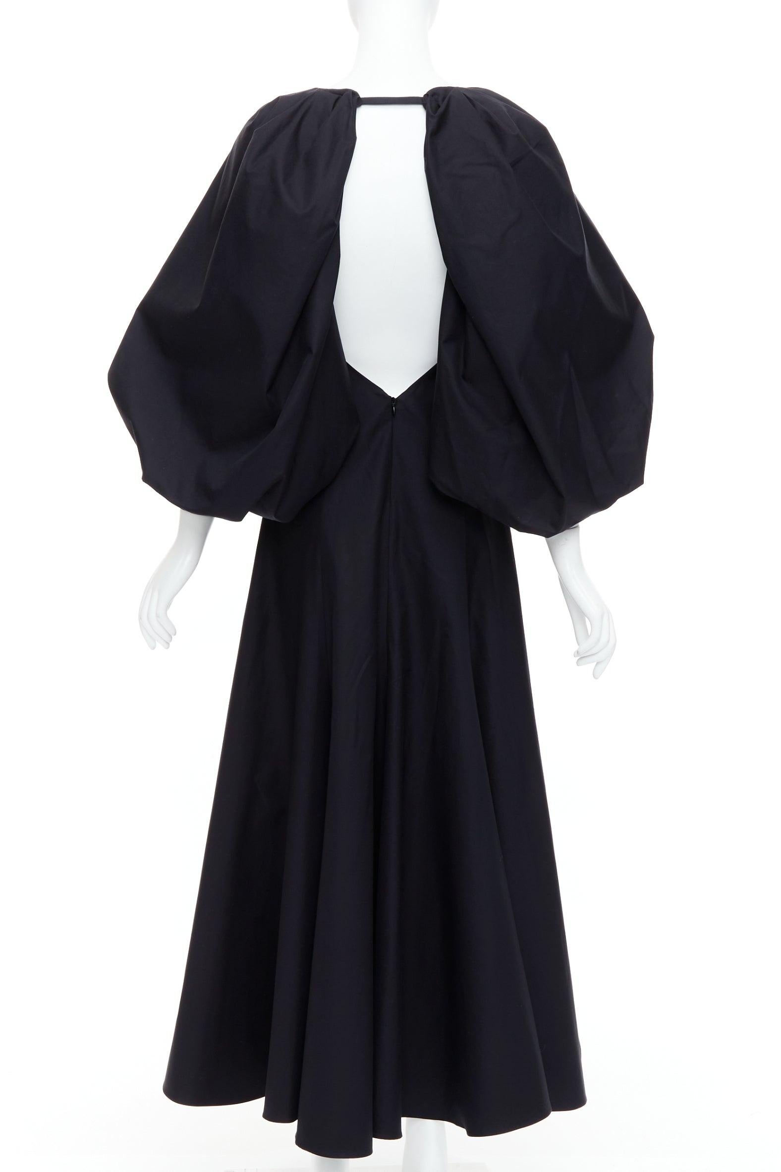 KHAITE Joanne black cotton balloon sleeved midi dress US0 XS
Reference: LNKO/A02486
Brand: Khaite
Model: Joanne
Material: Cotton
Color: Black
Pattern: Solid
Closure: Zip
Lining: Black Fabric
Extra Details: Khaite - Make an elegant impression at your