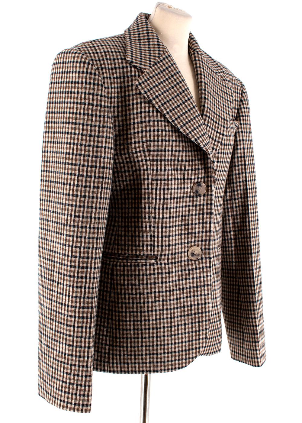 Khaite Oversized checked wool-blend blazer

- Presented in Khaite's Pre-AW19 lookbook
- This checked brown blazer showcases the New York label's impeccable tailoring
- It's cut to an oversized fit that's padded at the shoulders and streamlined