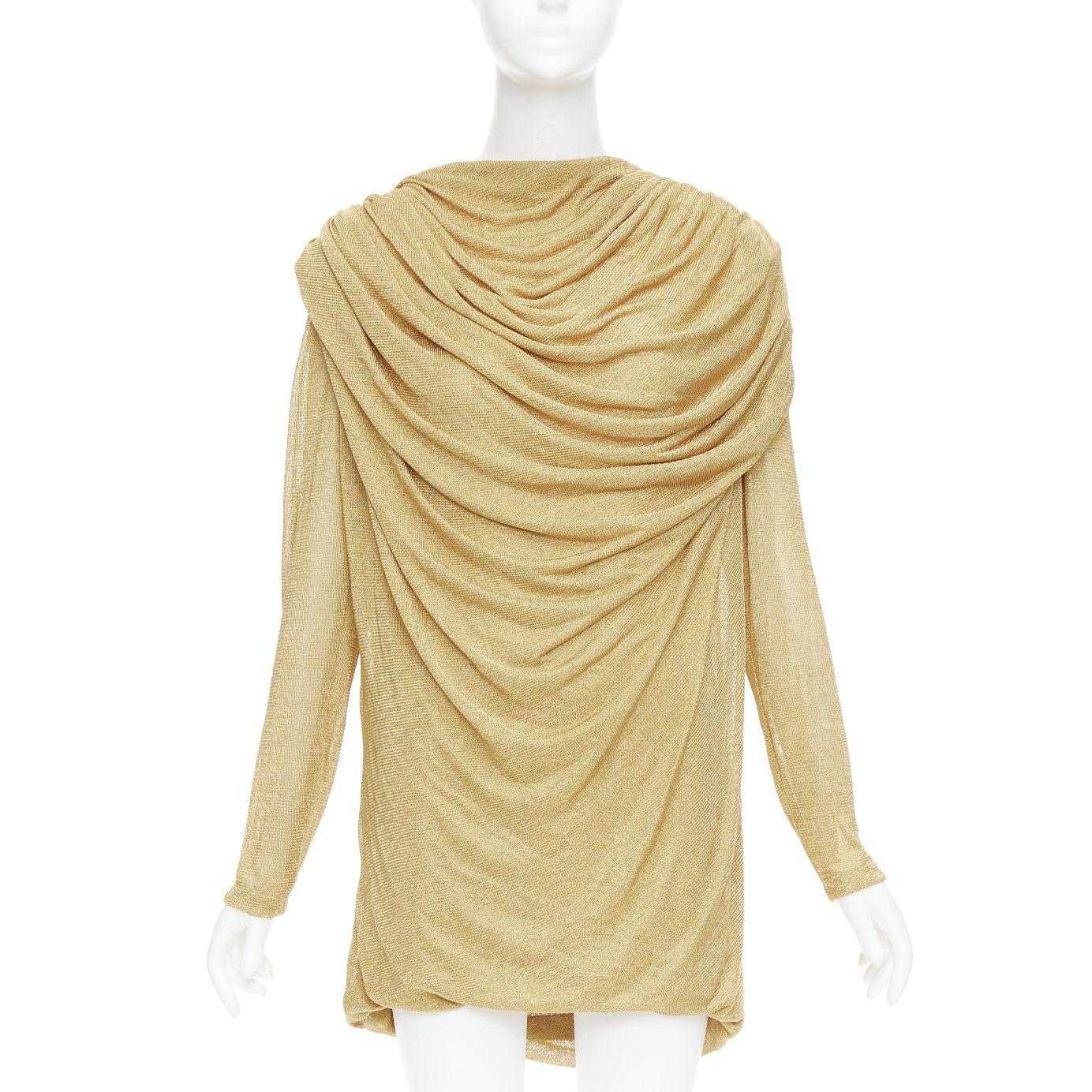 KHAITE Taiden gold metallic stretch knit drape open back mini dress L
Reference: KNLM/A00403
Brand: Khaite
Model: Taiden
Material: Viscose, Blend
Color: Gold
Pattern: Solid
Closure: Snap Buttons
Lining: Gold Fabric
Extra Details: Dial up the glam at