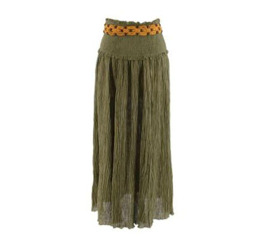 Zimmermann Khaki Crinkle Cotton Belted Maxi Skirt 
 
 - Lightweight crinkled cotton, with a shirred waistband panel
 - Woven yellow cotton belt with wooden beads 
 
 Materials: 
 55% Ramie 
 45% Cotton 
 
 Made in China 
 Gentle Cold Hand Wash 
 
