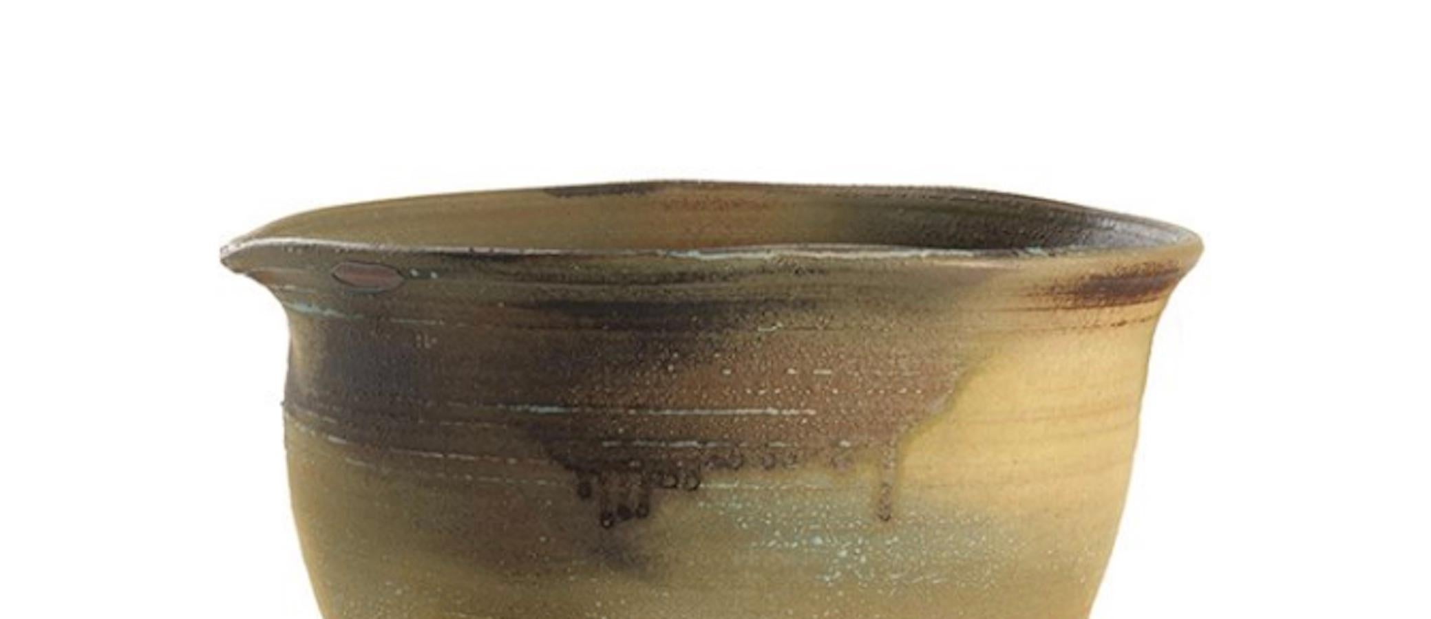 Contemporary Chinese ceramic bowl with decorative drip glaze
Shades of khaki, dark brown, sage and light blue
Matte finish
