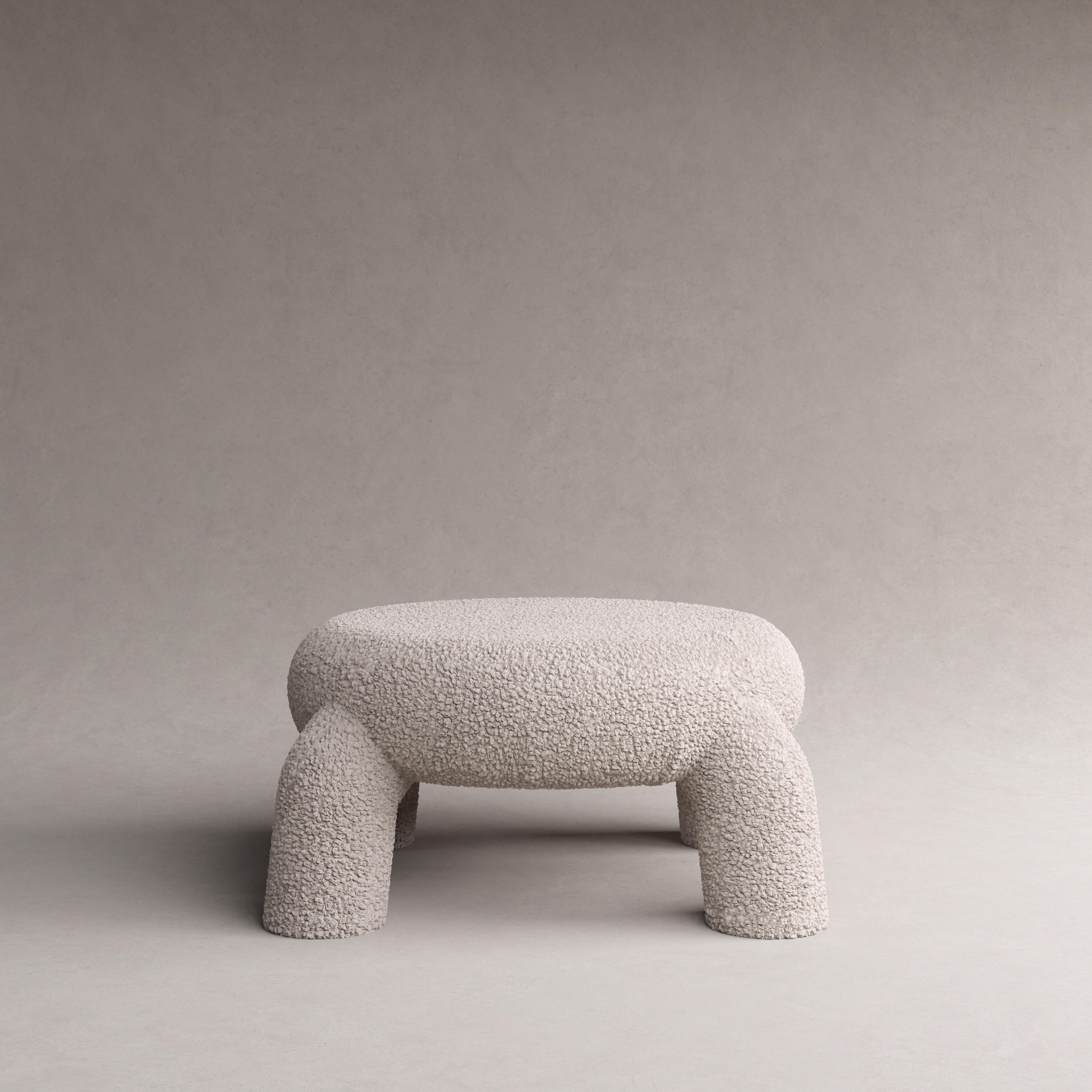 Khelone ottoman by Pietro Franceschini
Sold exclusively by Galerie Philia
Manufacturer : Stefano Minotti
Dimensions: W 79 x H 42 cm
Materials: Lamb.

Available in Bouclé

Pietro Franceschini is an architect and designer based in New York and