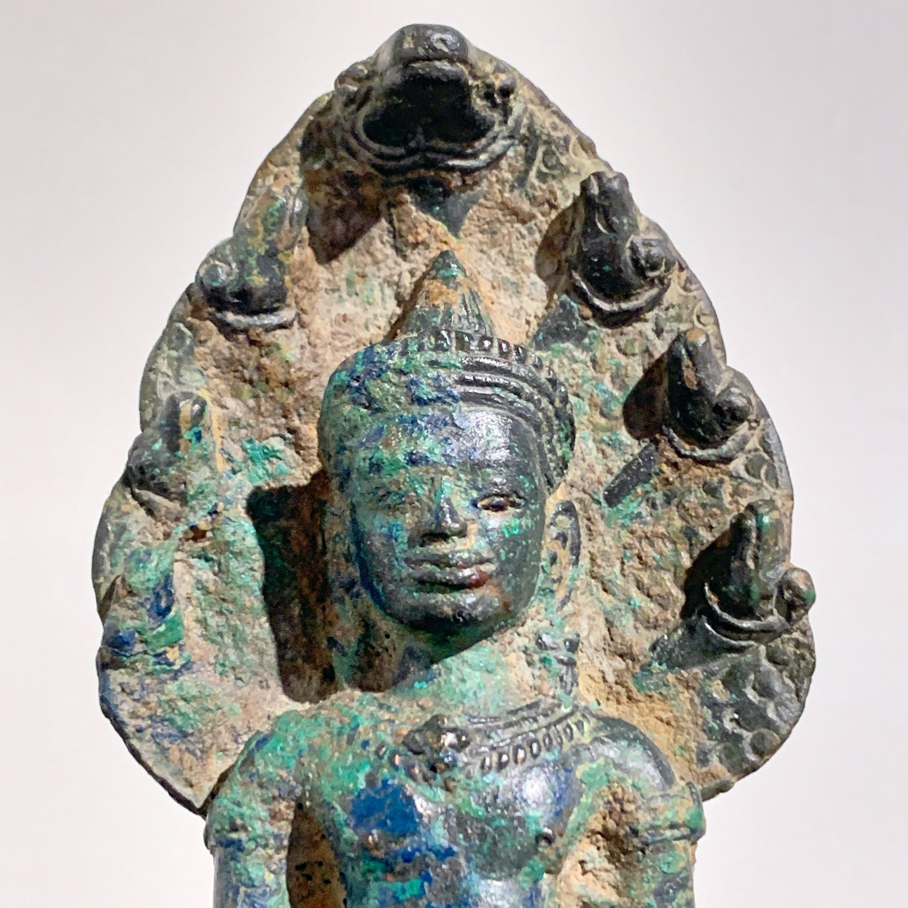 Cast Khmer Bronze Buddha with Naga, Angkor Period, Style of the Bayon, 14th Century