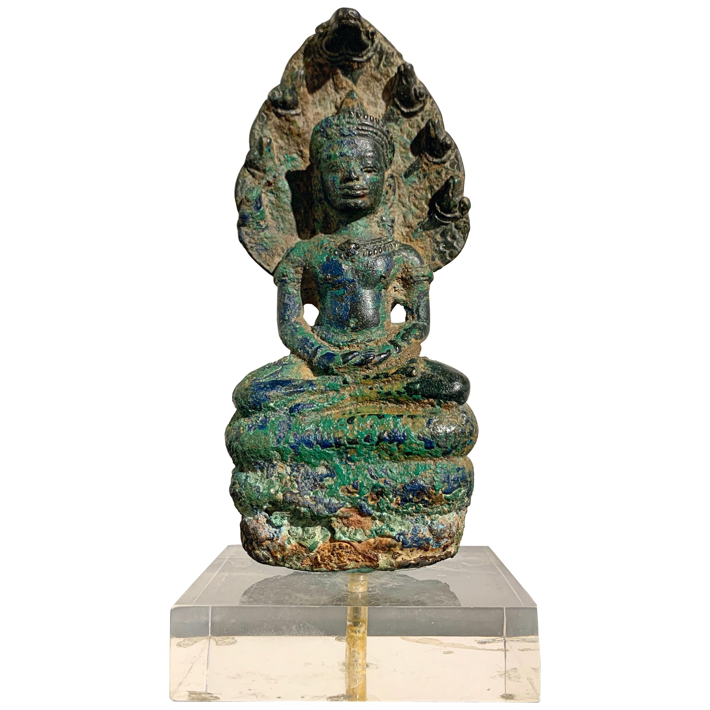 Khmer Bronze Buddha with Naga, Angkor Period, Style of the Bayon, 14th Century