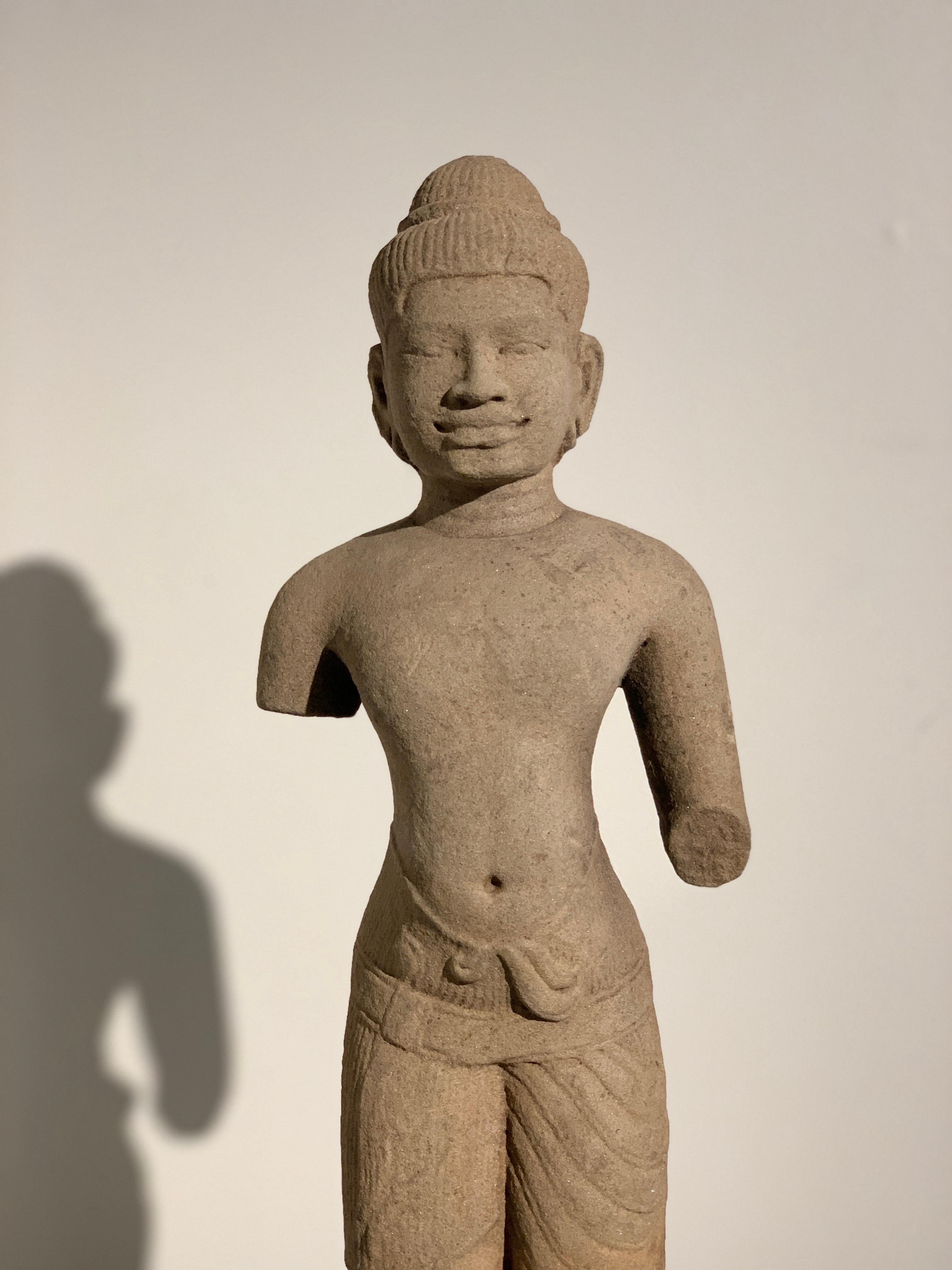 Khmer Carved Sandstone Male Deity, Style of the Baphoun, 11th Century In Good Condition For Sale In Austin, TX